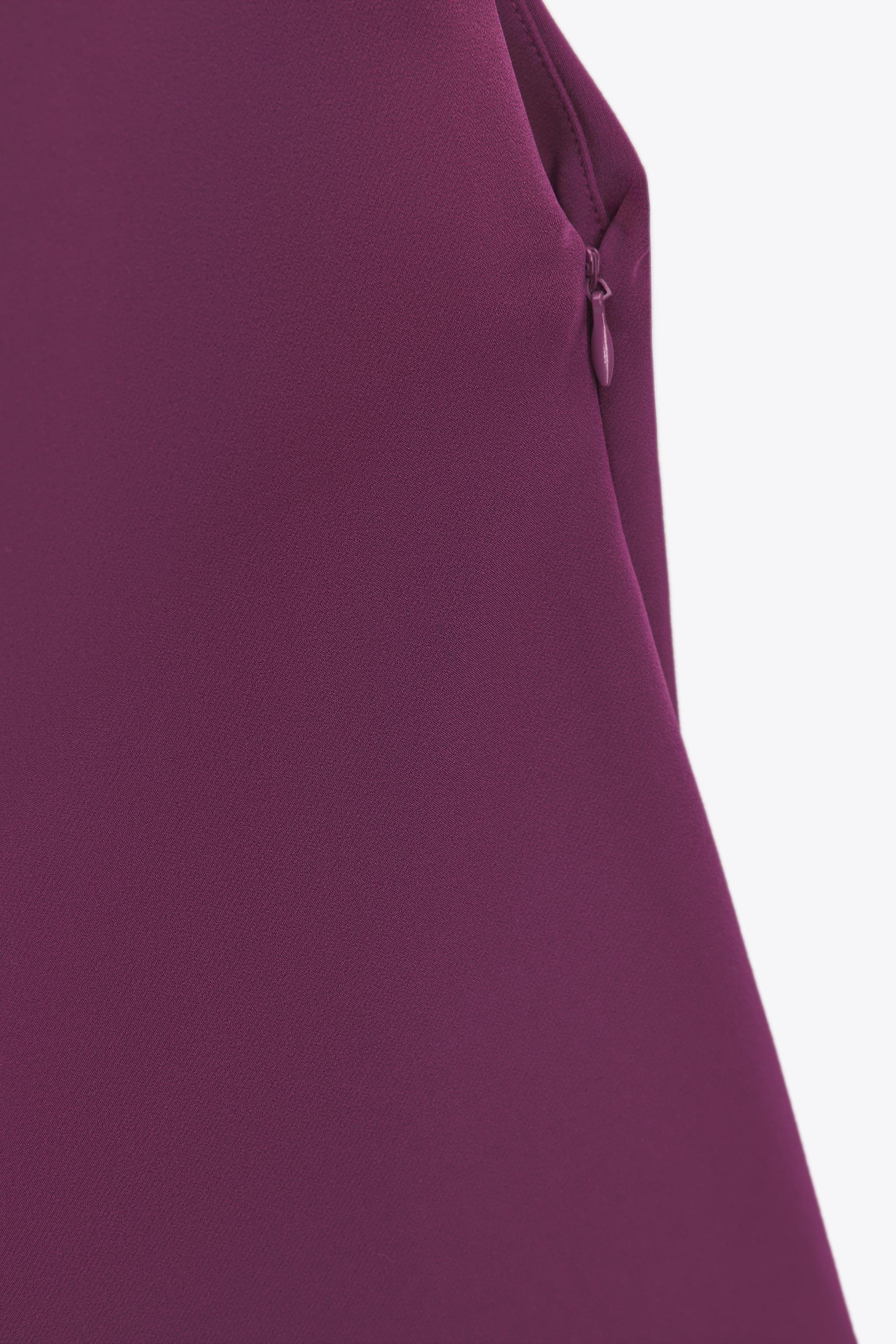 ASYMMETRIC CREPE BUCKLE TOP