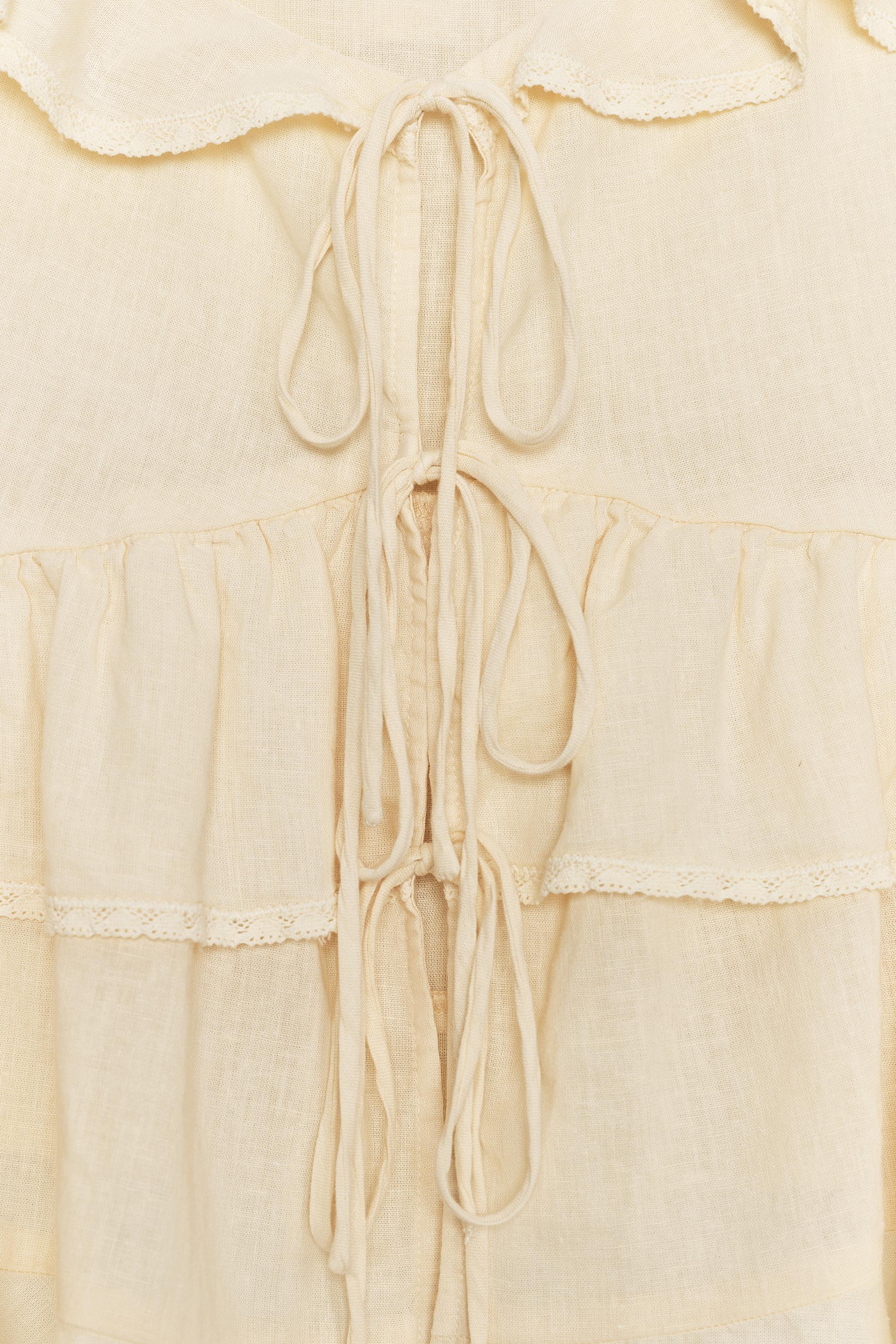 LINEN LACE TRIM RUFFLED TOP