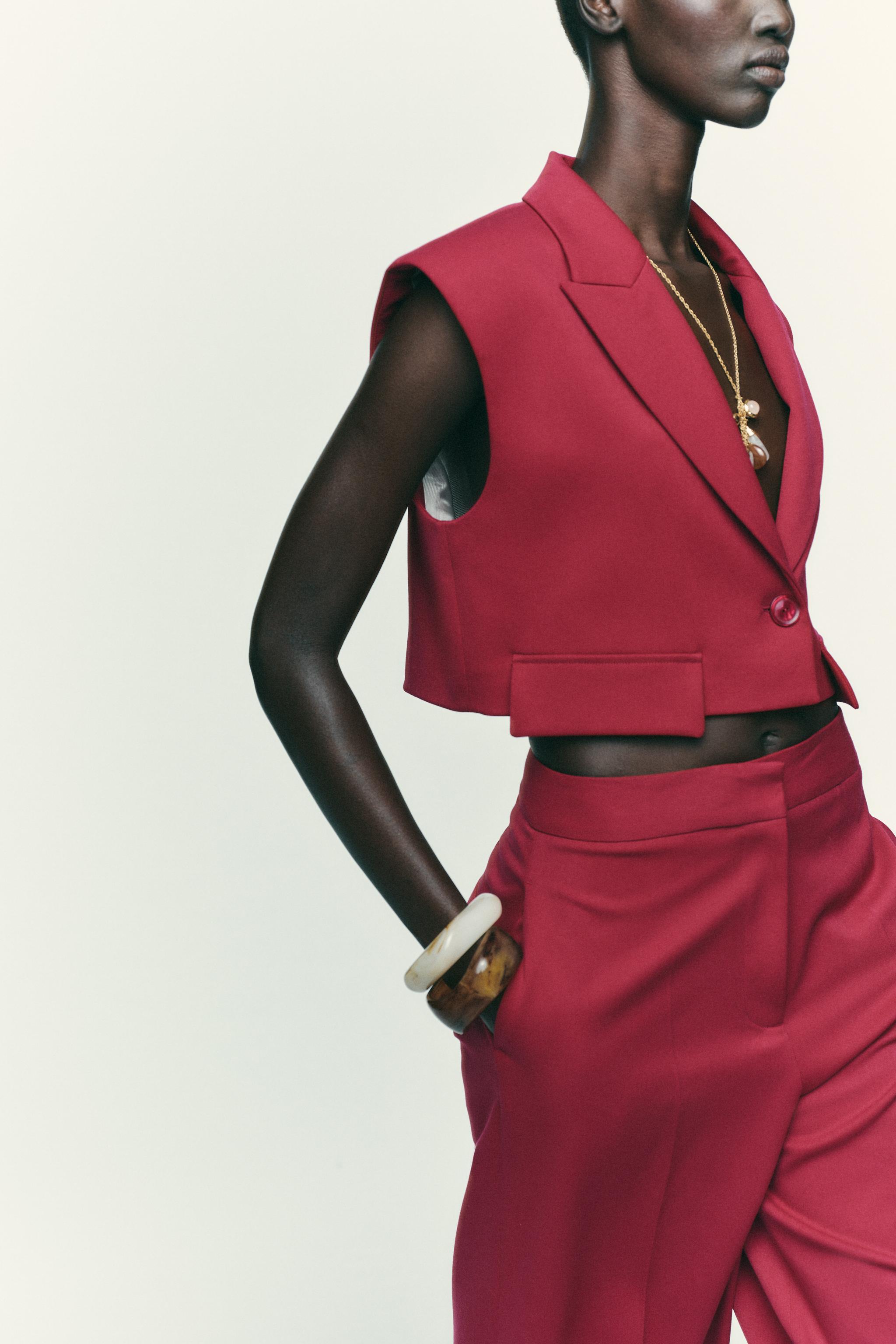 SHORT VEST WITH FLAPS