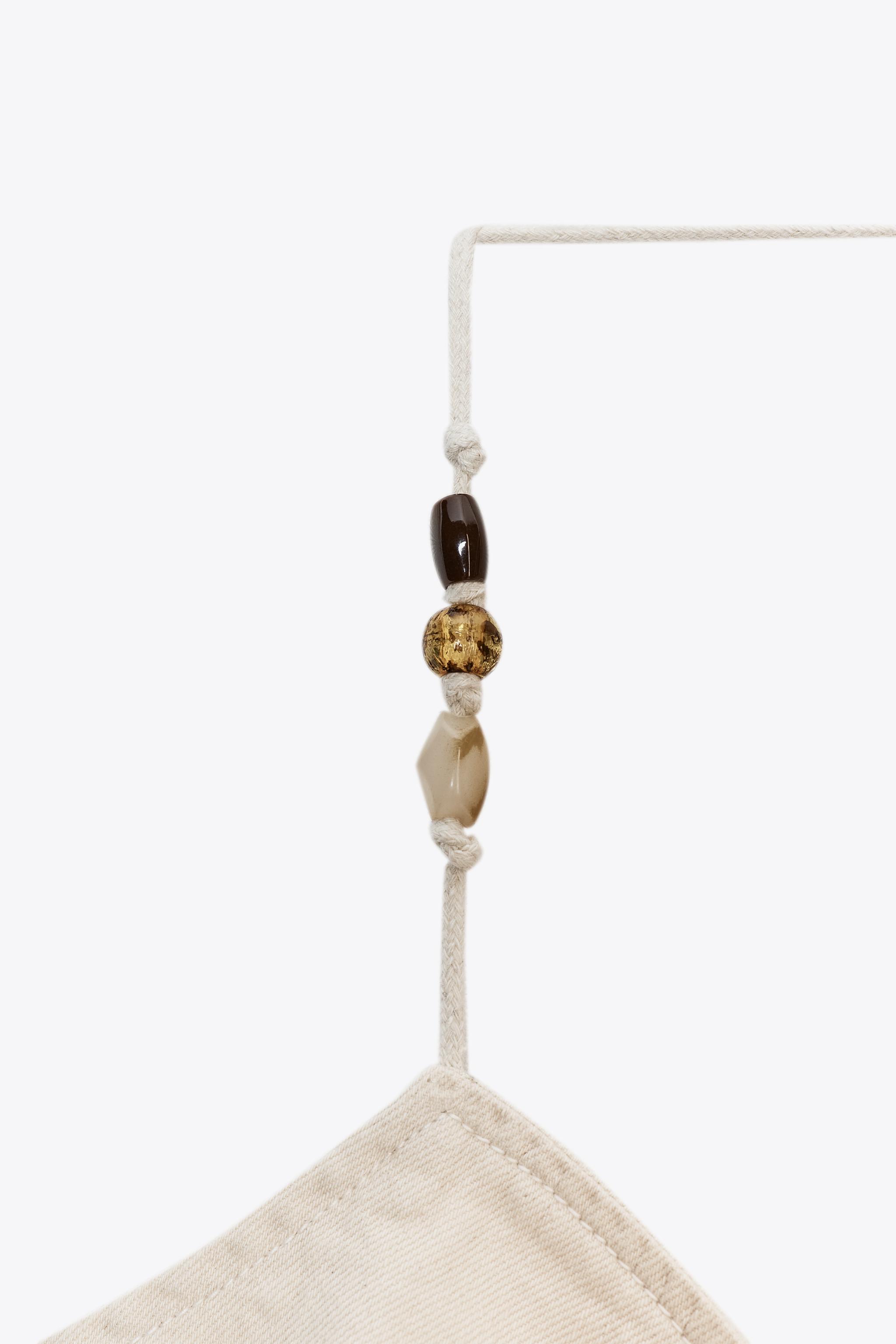 BEADED DENIM HALTER TOP