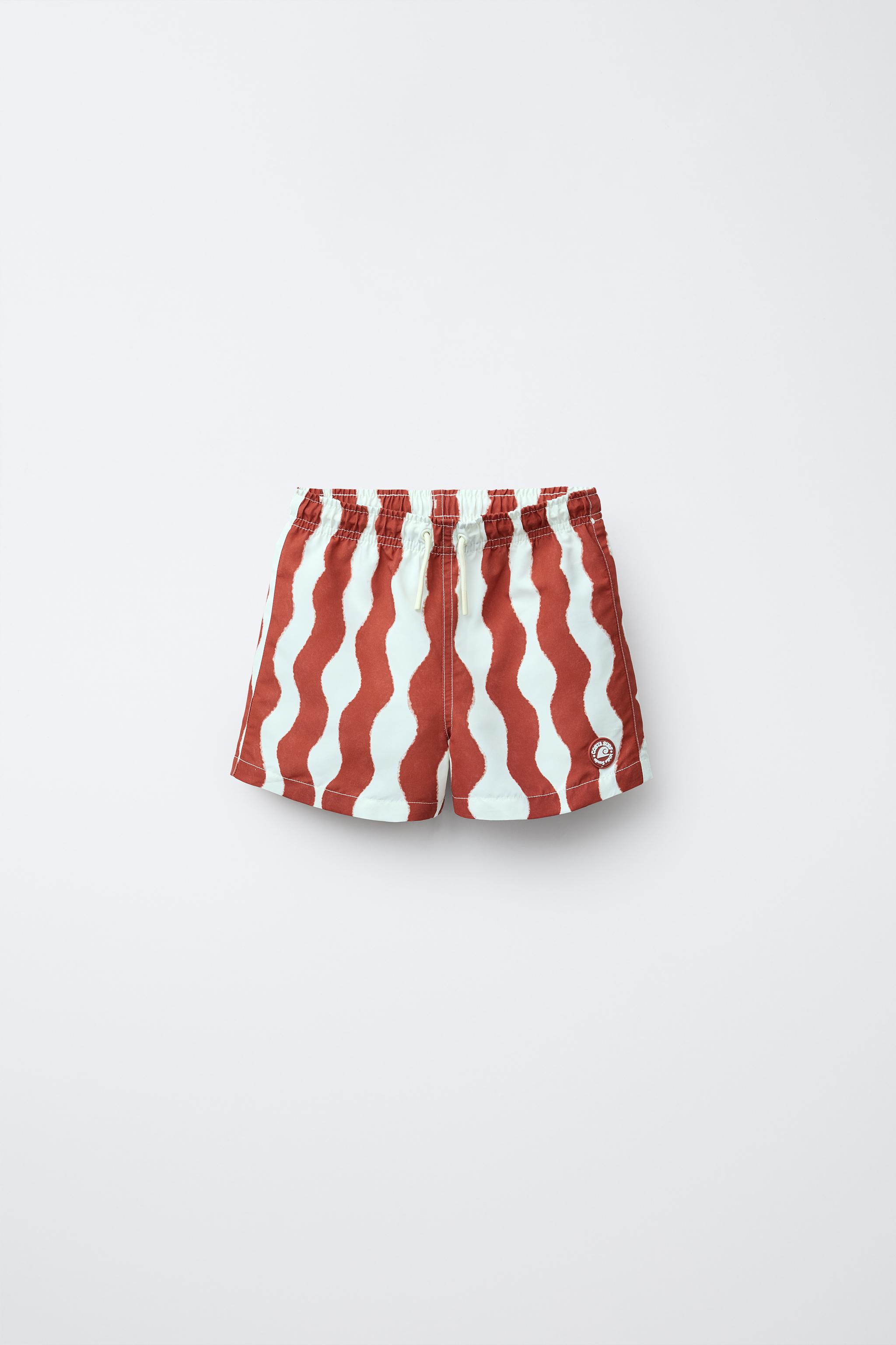 6-14 YEARS/ WAVE PRINT SWIM SHORTS