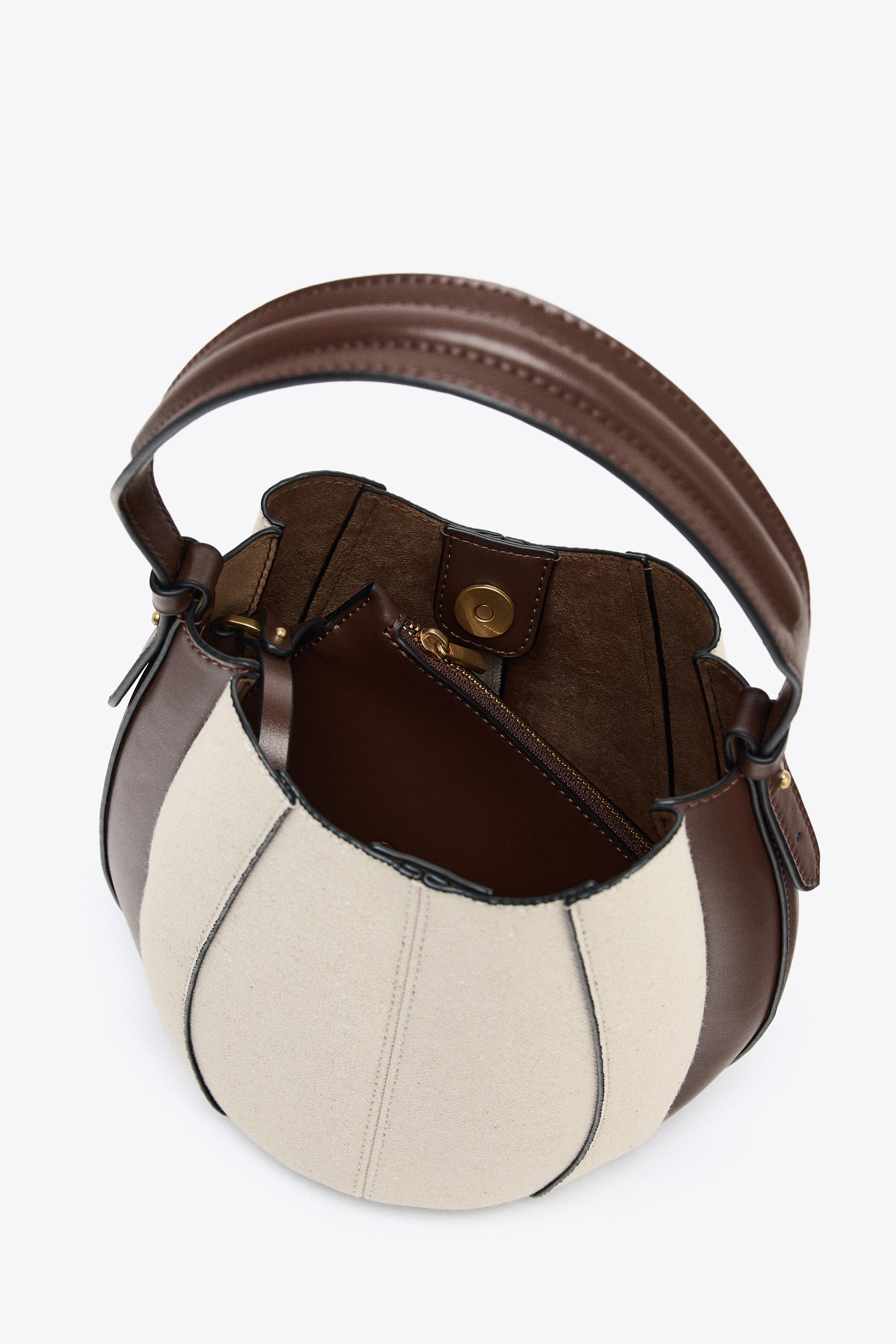 TOPSTITCHED BUCKET BAG
