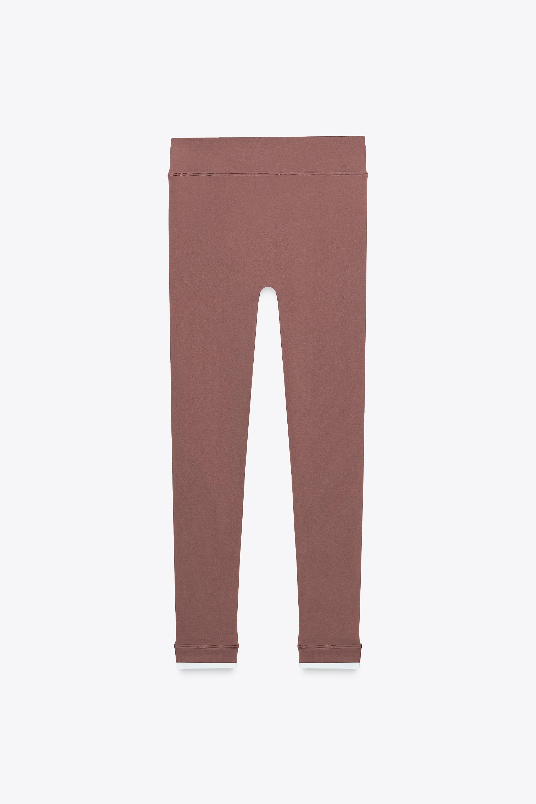 SEAMLESS ZIPPERED LEGGINGS