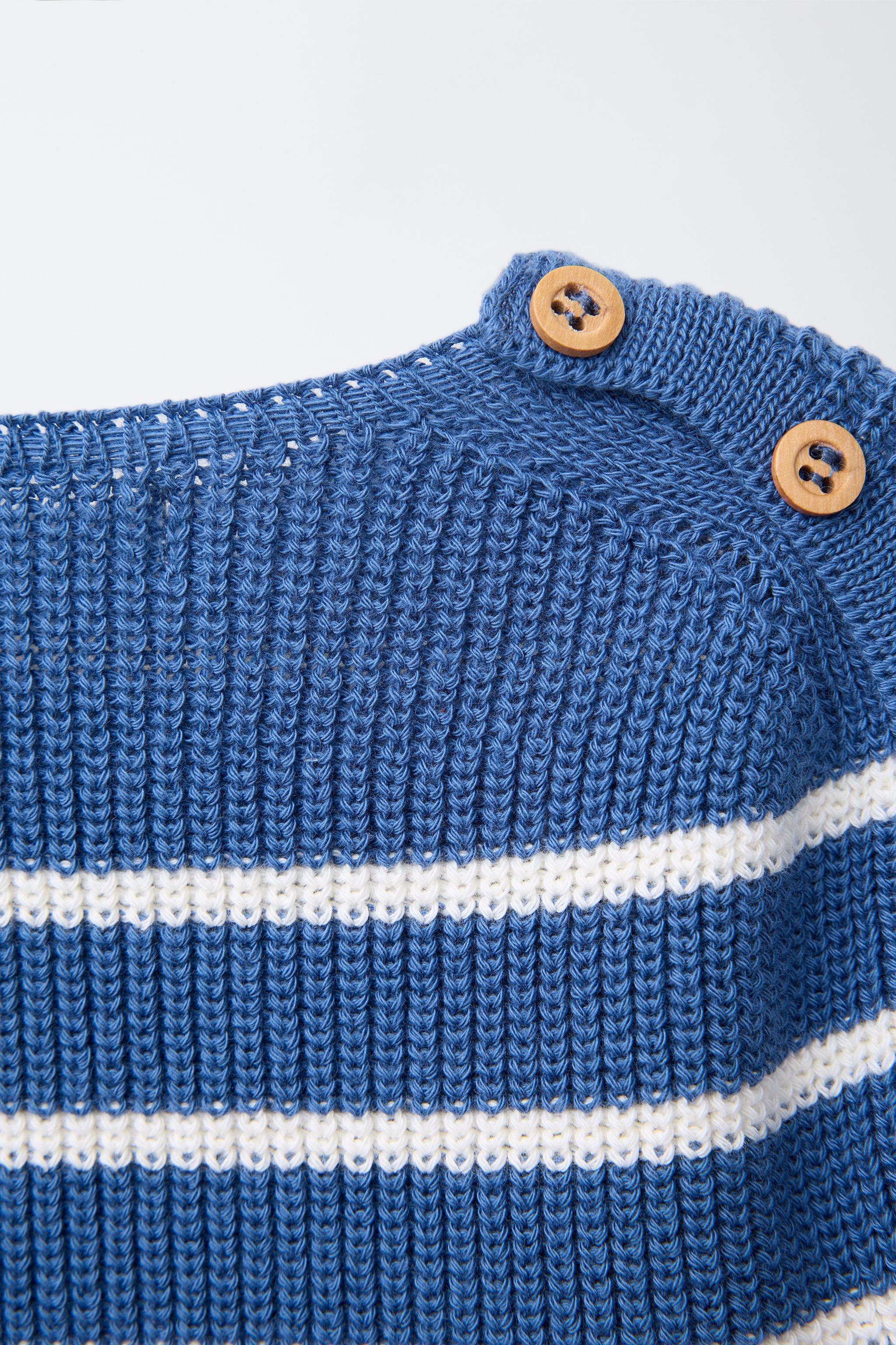 STRIPED KNIT SWEATER