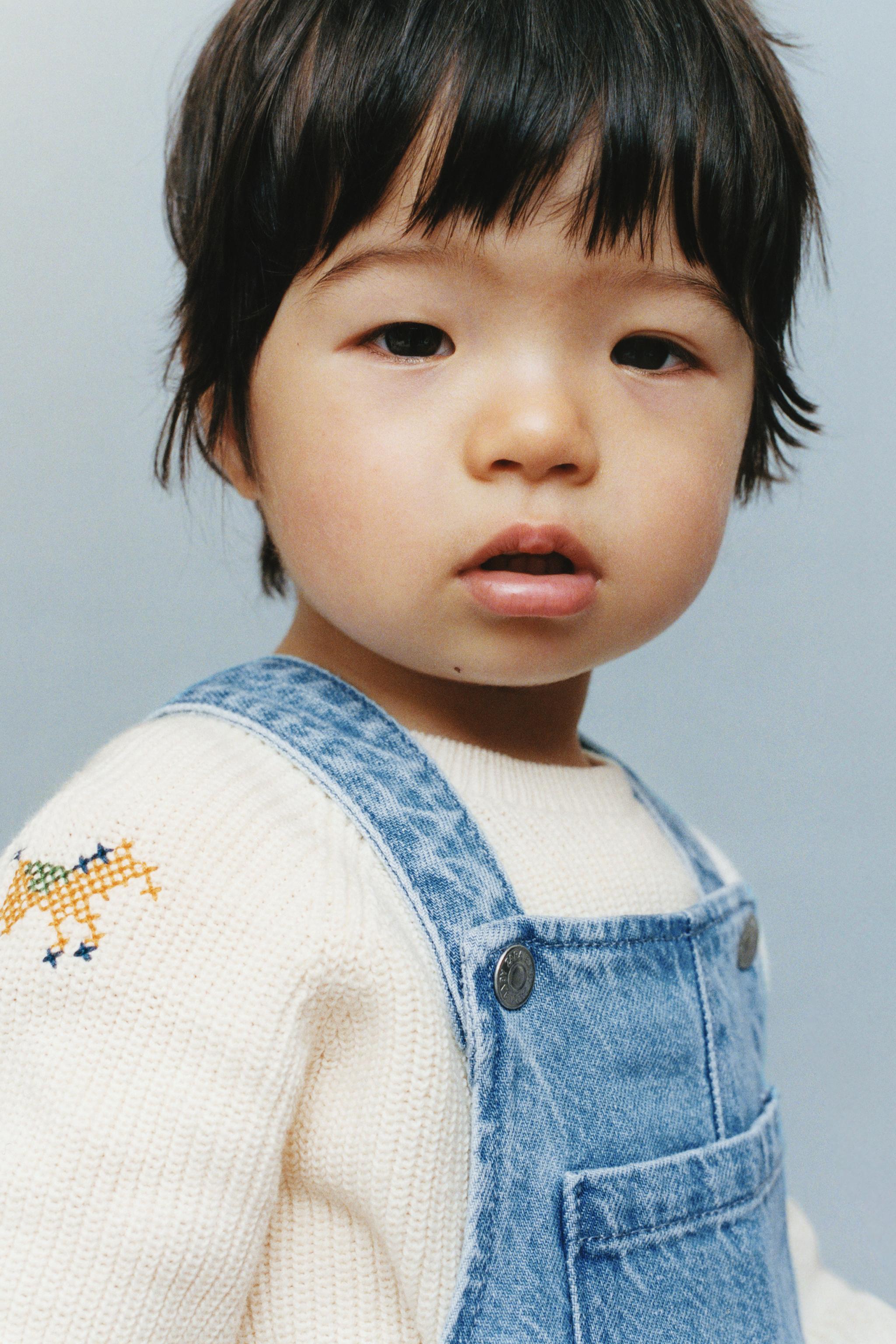 KNIT SWEATER WITH CROSS STITCH DETAILS