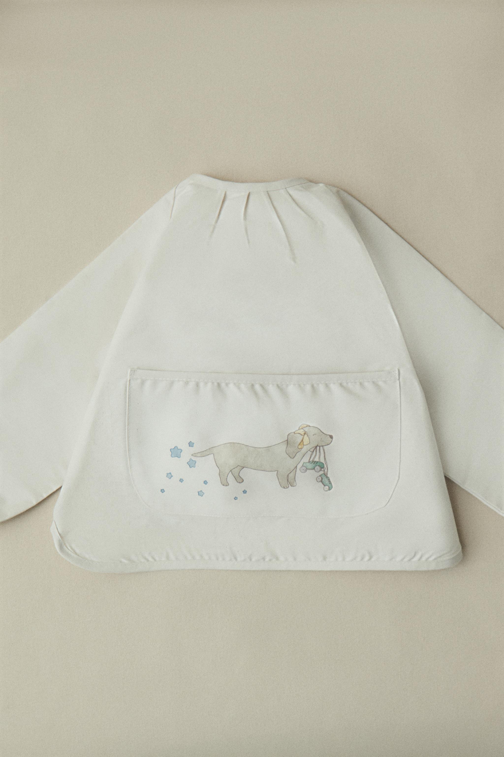 CHILDREN'S SKATING DOG BIB WITH SLEEVES