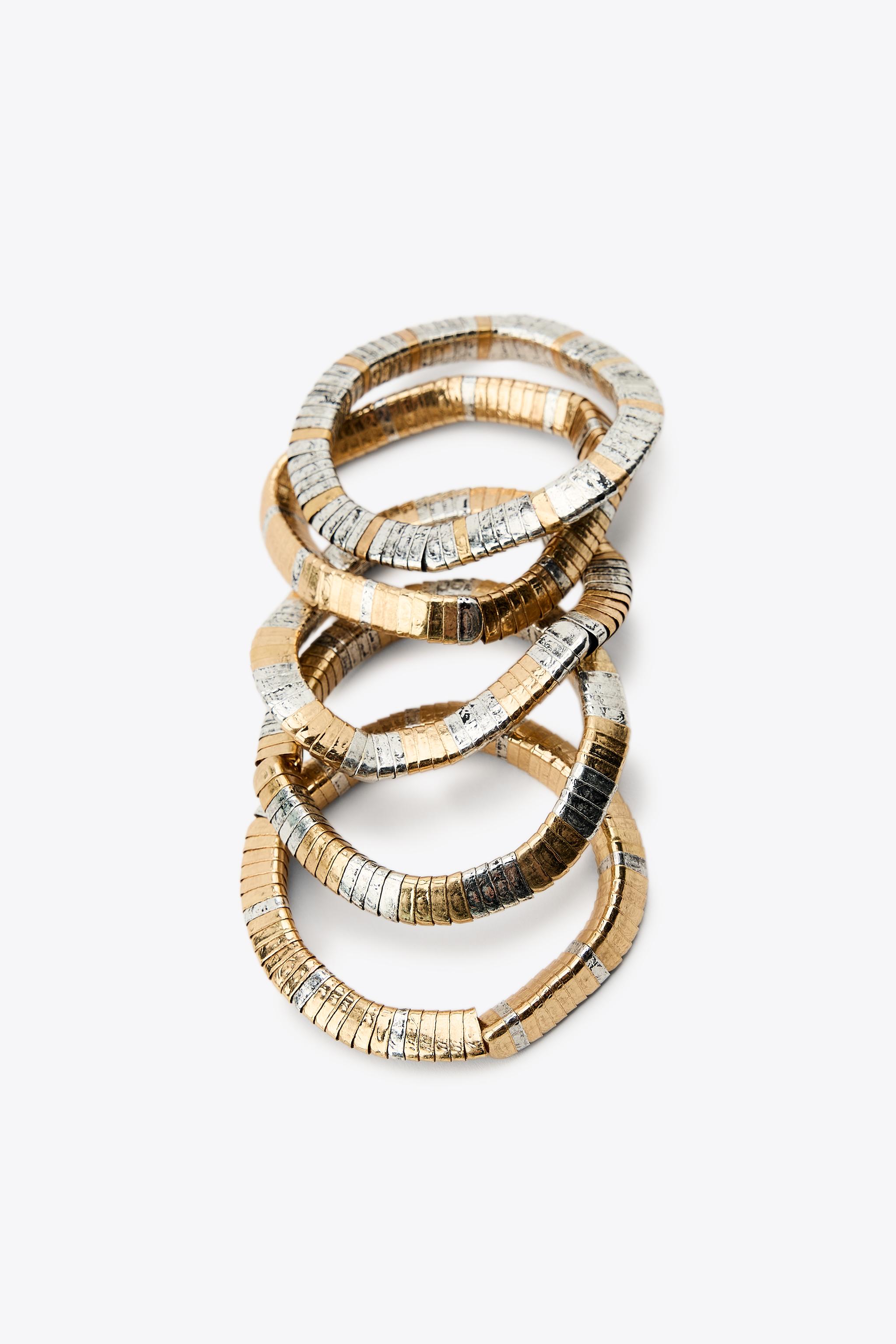 PACK OF ELASTIC BRACELETS WITH METAL PIECES