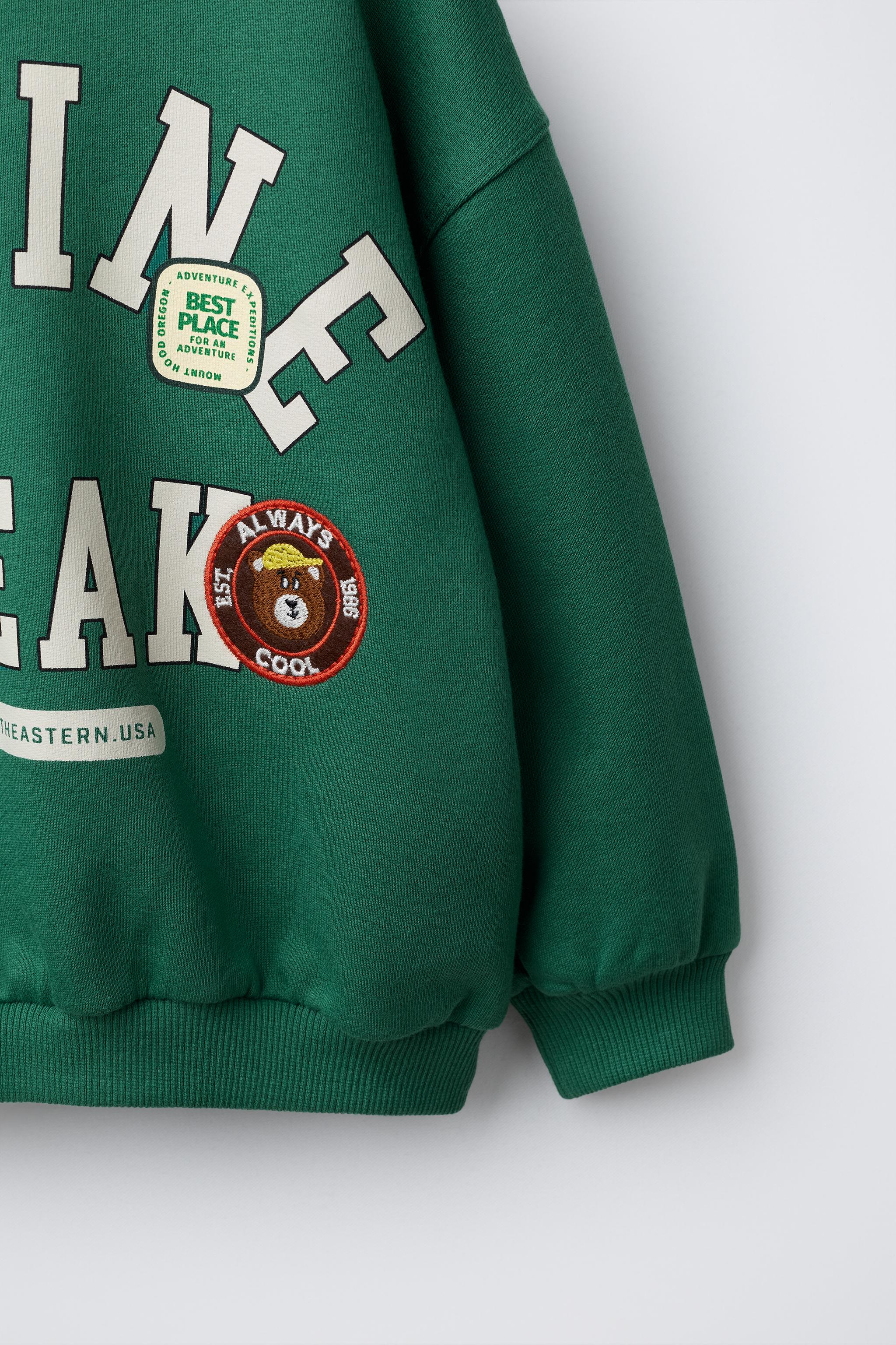 TEXT AND BEAR PATCH SWEATSHIRT