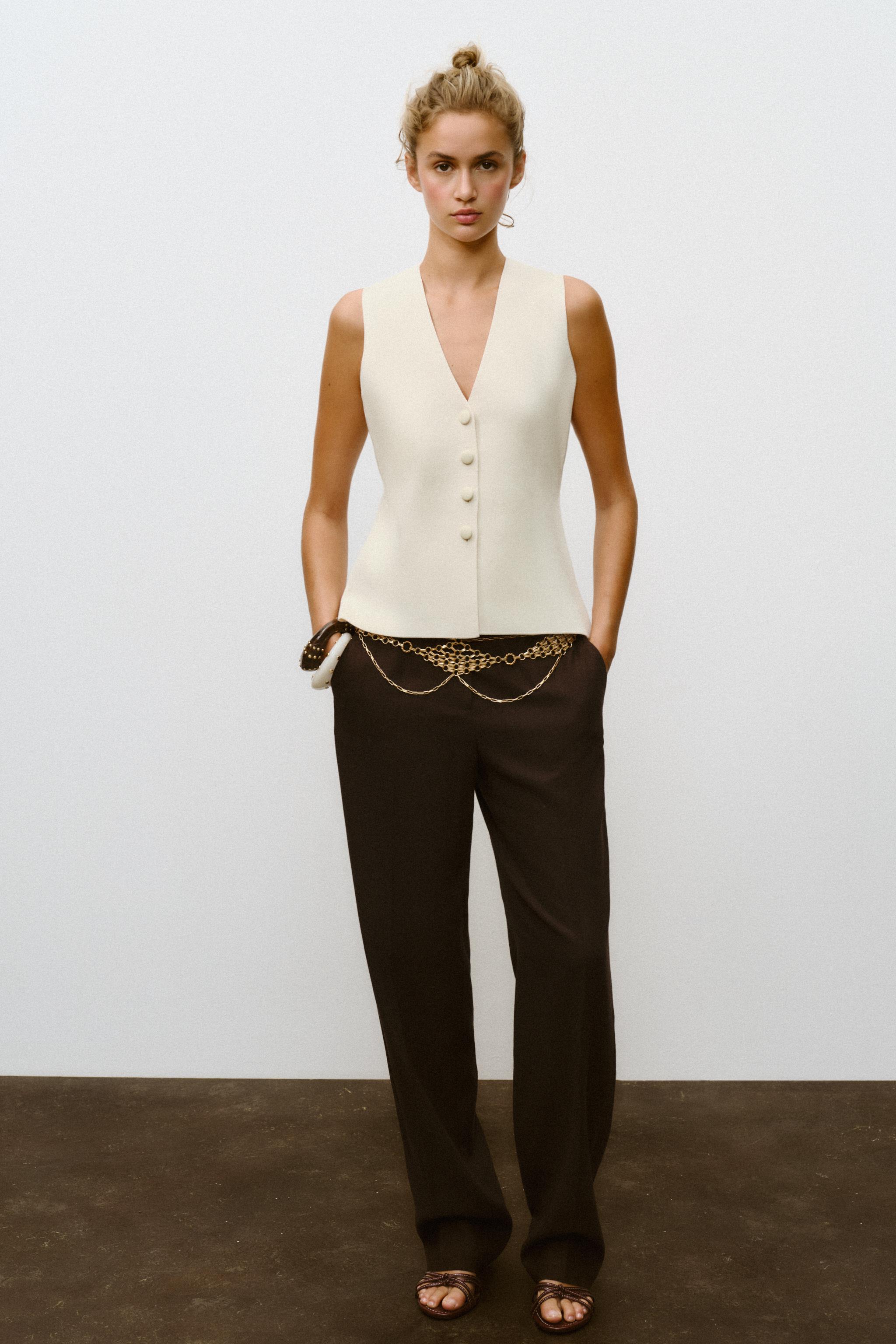 COVERED BUTTON KNIT VEST