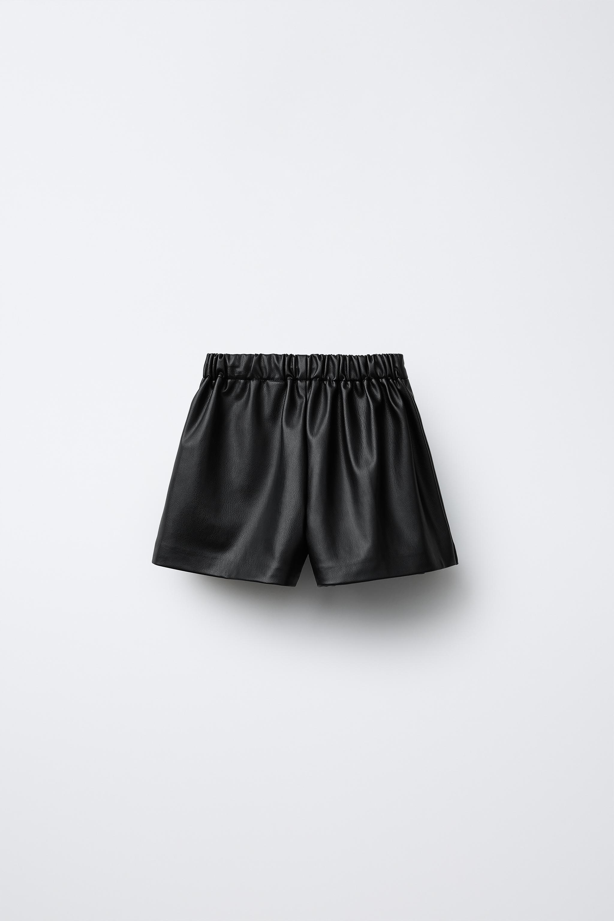 FAUX LEATHER TIED SKORT