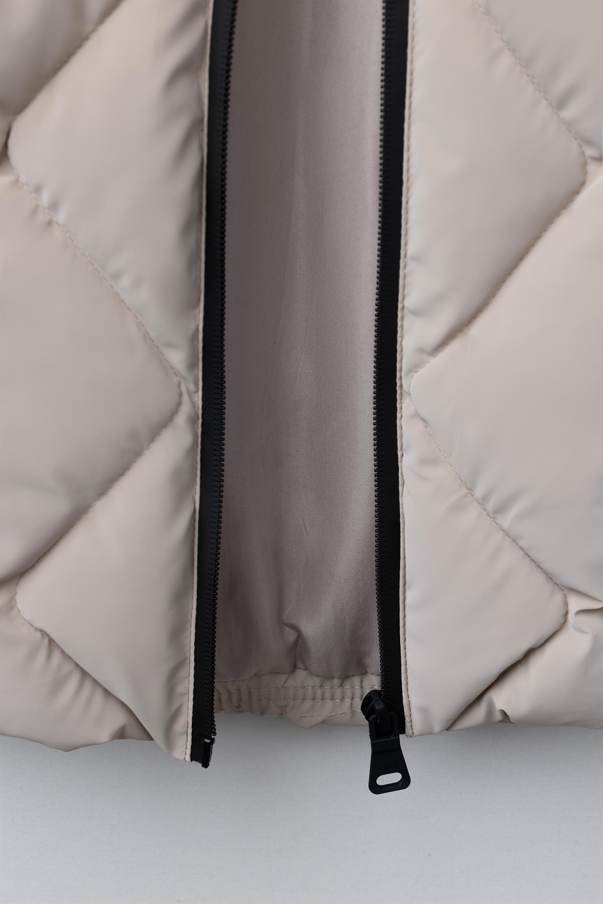 LIGHTWEIGHT RUBBERIZED PUFFER COAT