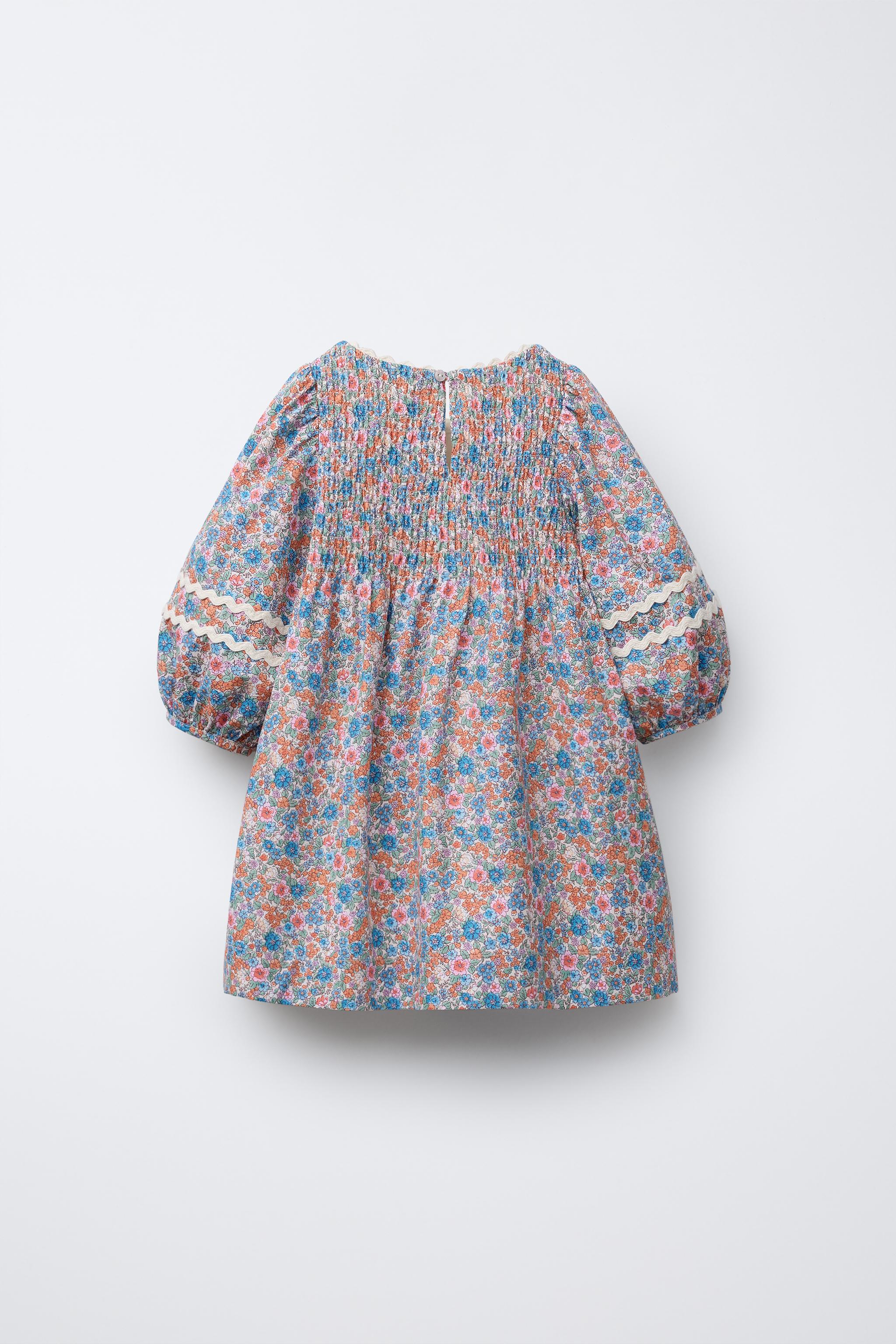 WAVY TRIM FLORAL DRESS