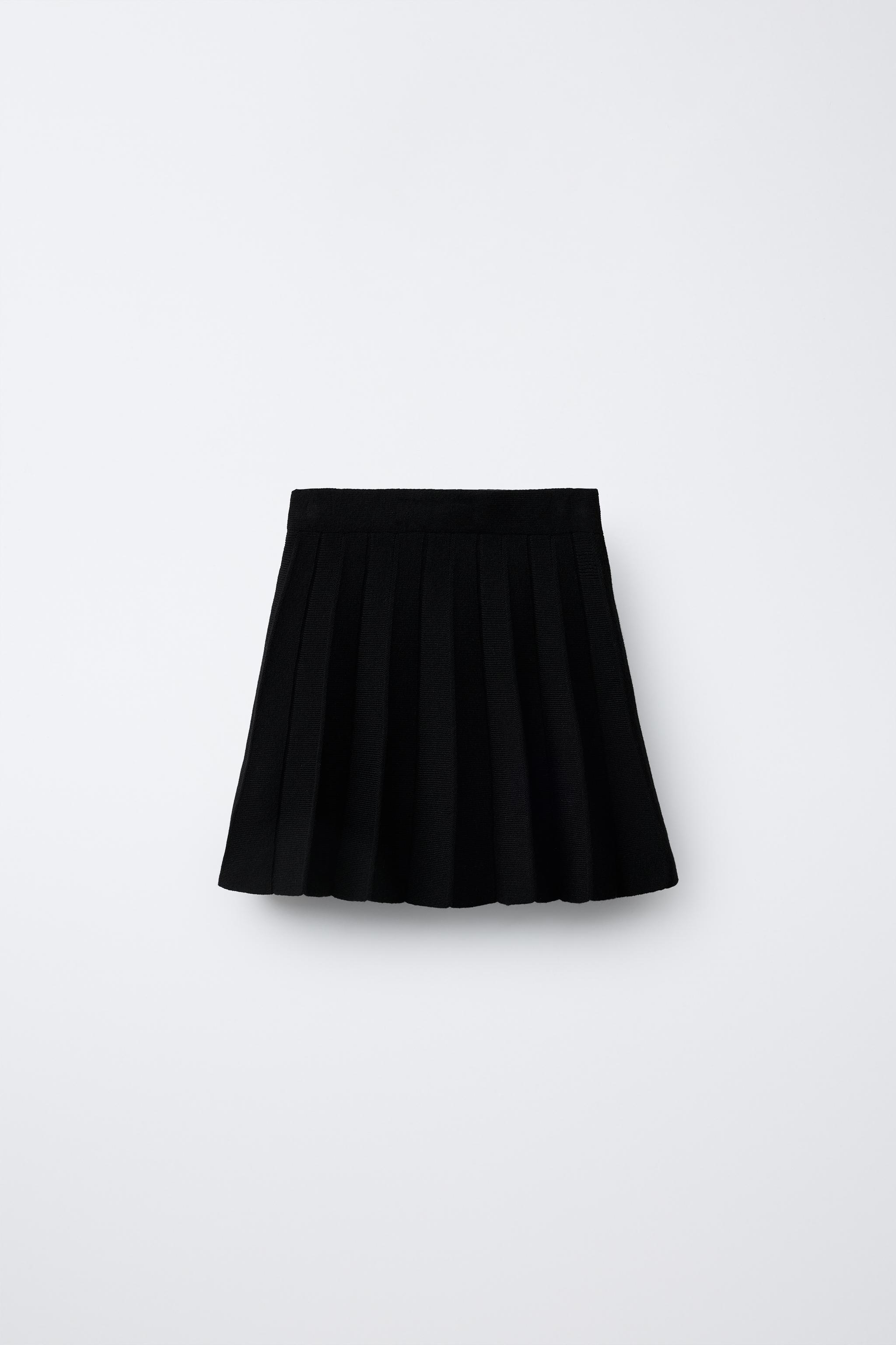 PLEATED KNIT SKIRT
