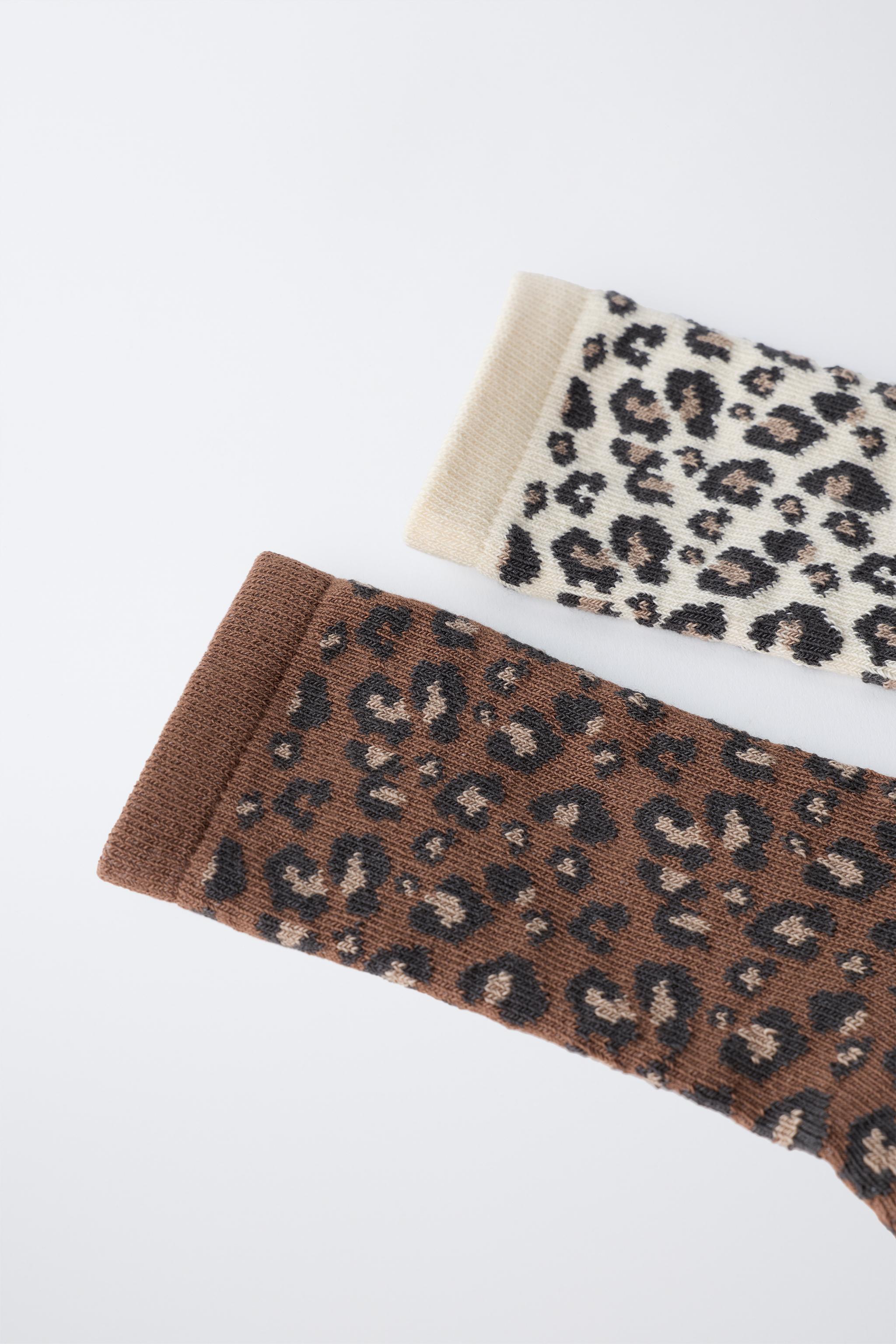 TWO-PACK OF LONG ANIMAL PRINT SOCKS