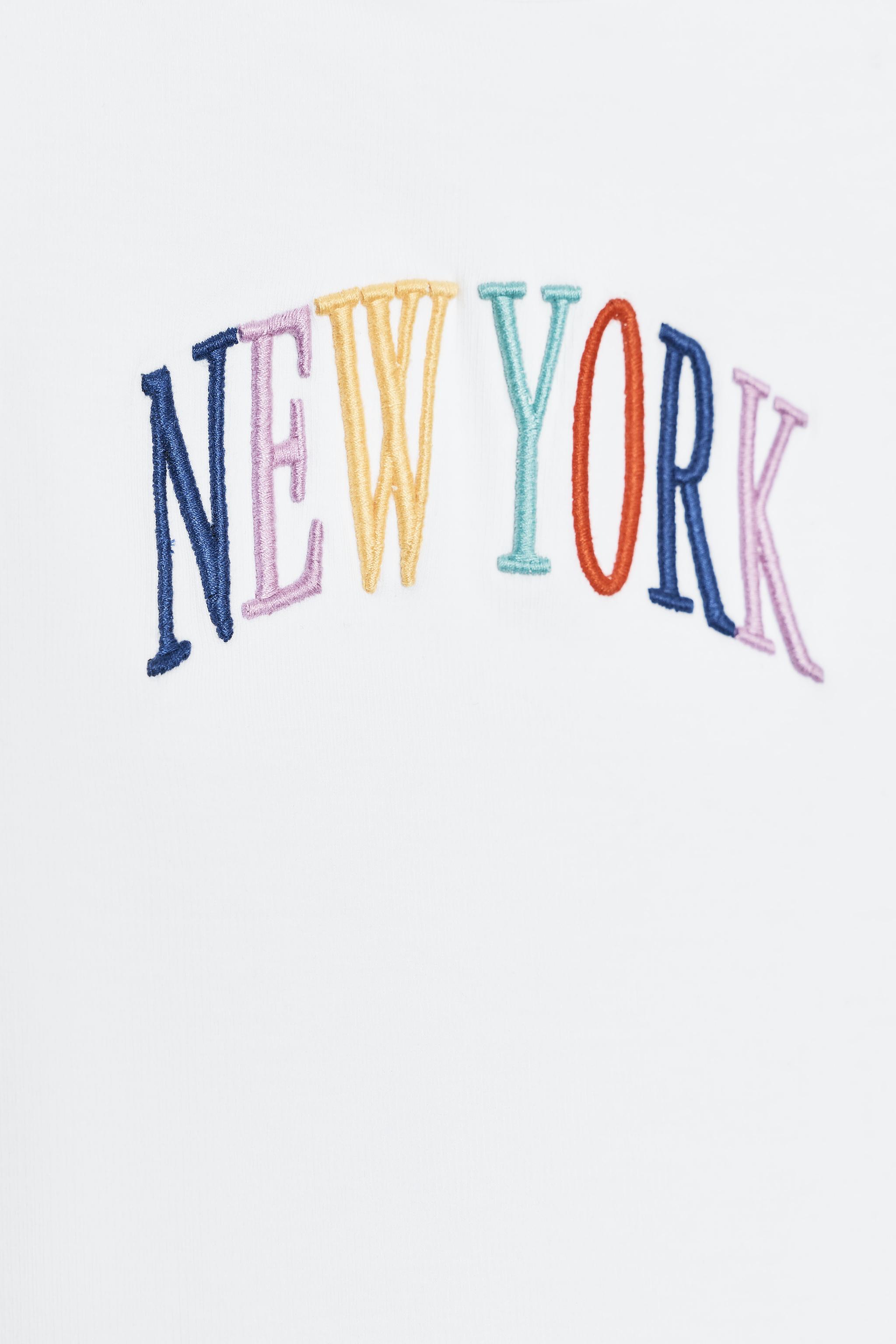 EMBROIDERED TEXT TOP