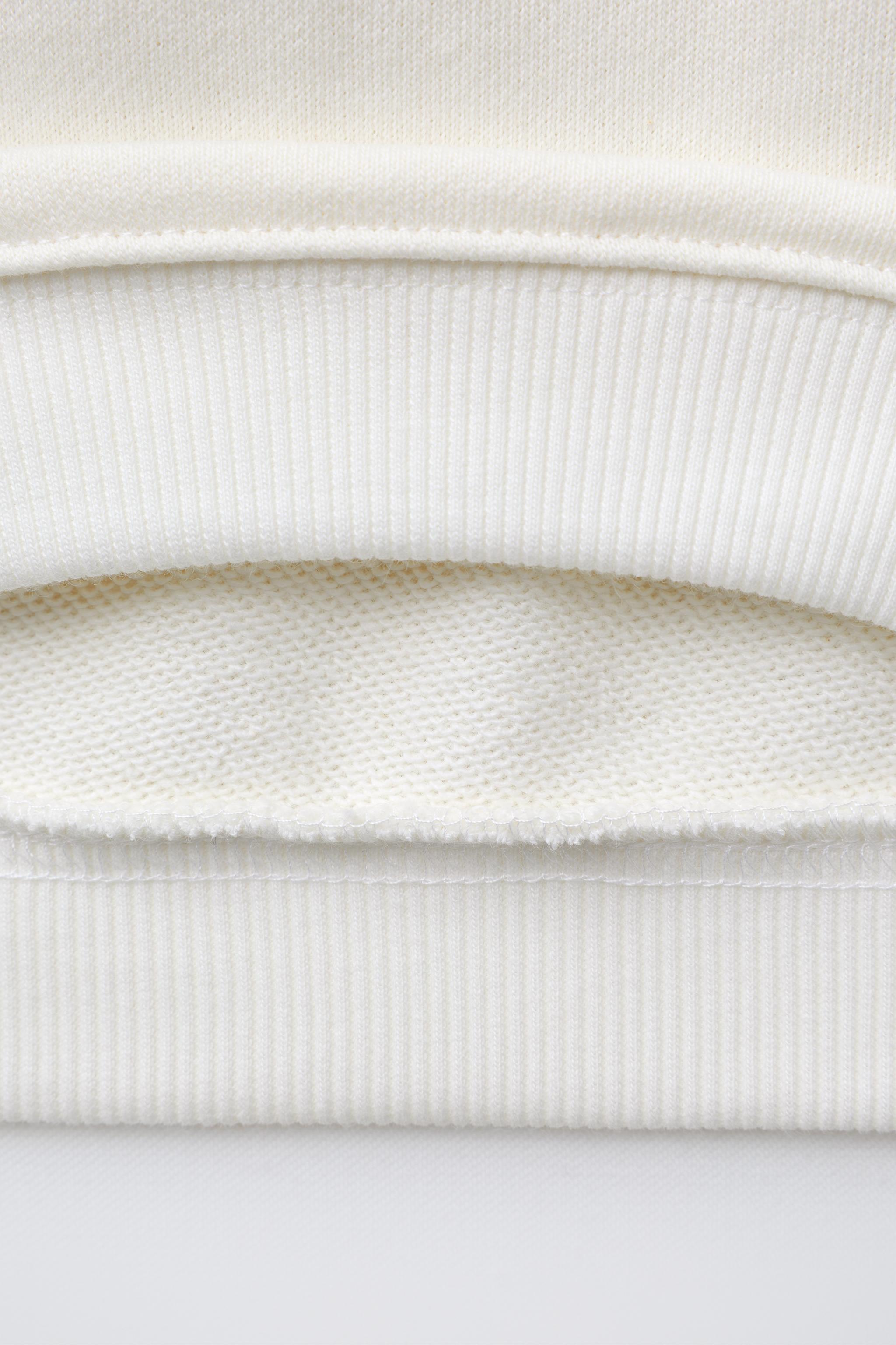 CITY GLITTER SWEATSHIRT