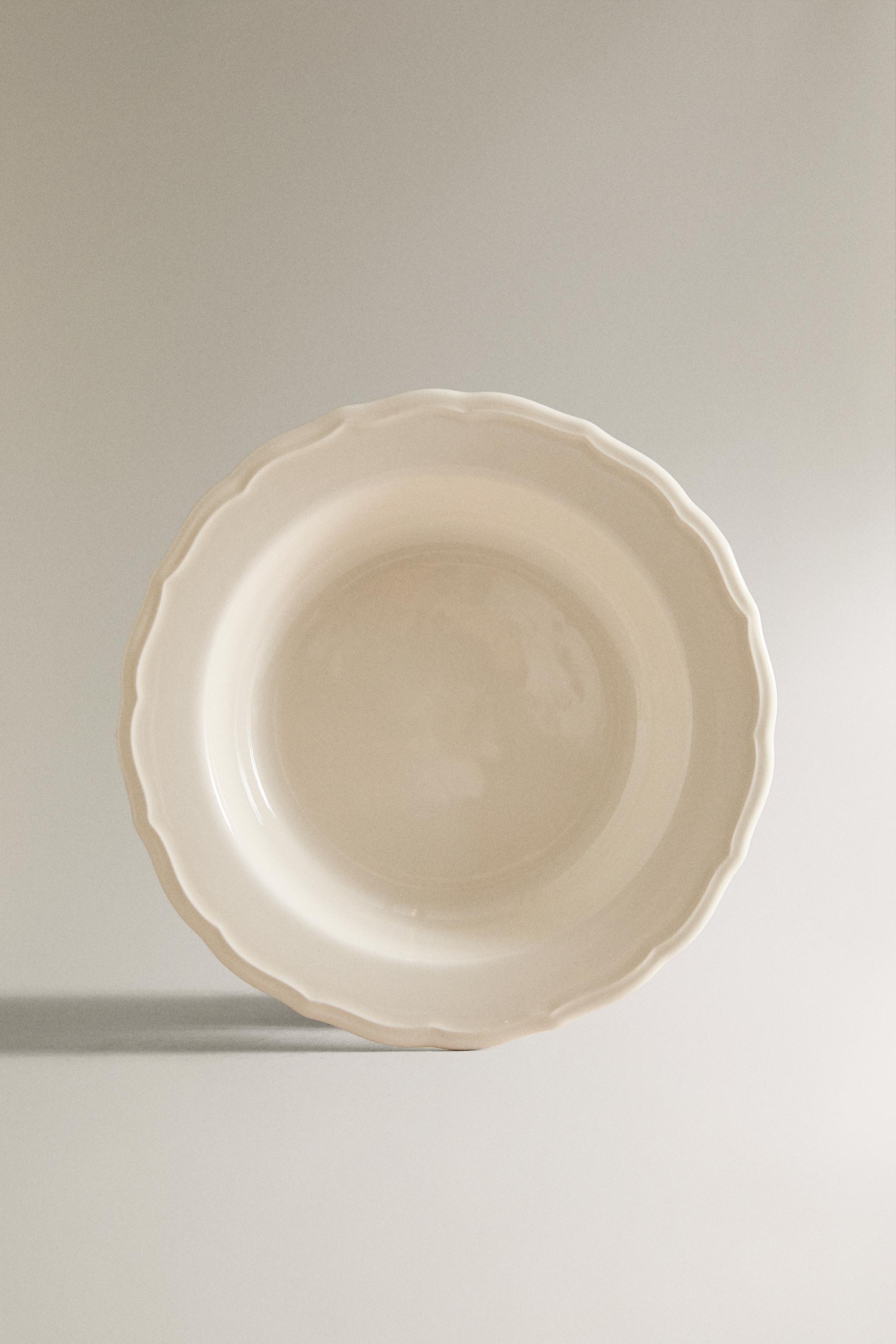 EARTHENWARE SOUP PLATE WITH RAISED-DESIGN EDGE