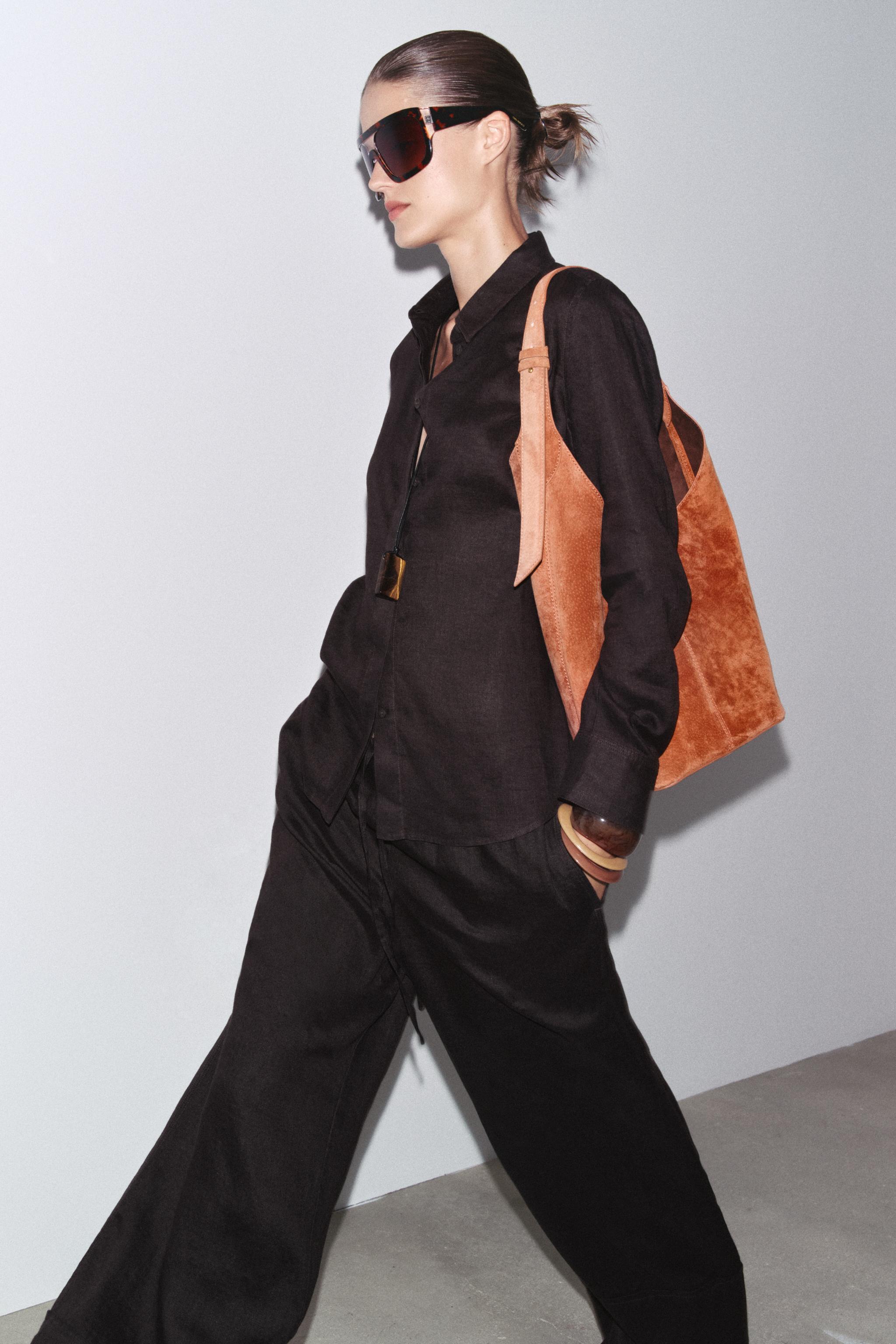 LEATHER MAXI BUCKET BAG WITH HANDLE DETAIL