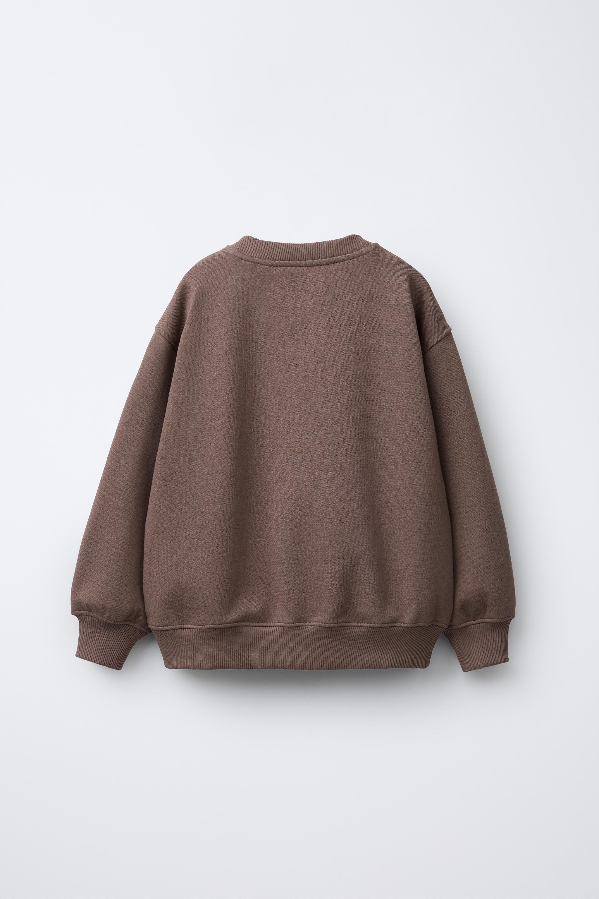 CINNAMOROLL © SANRIO FLOCKED PRINT SWEATSHIRT