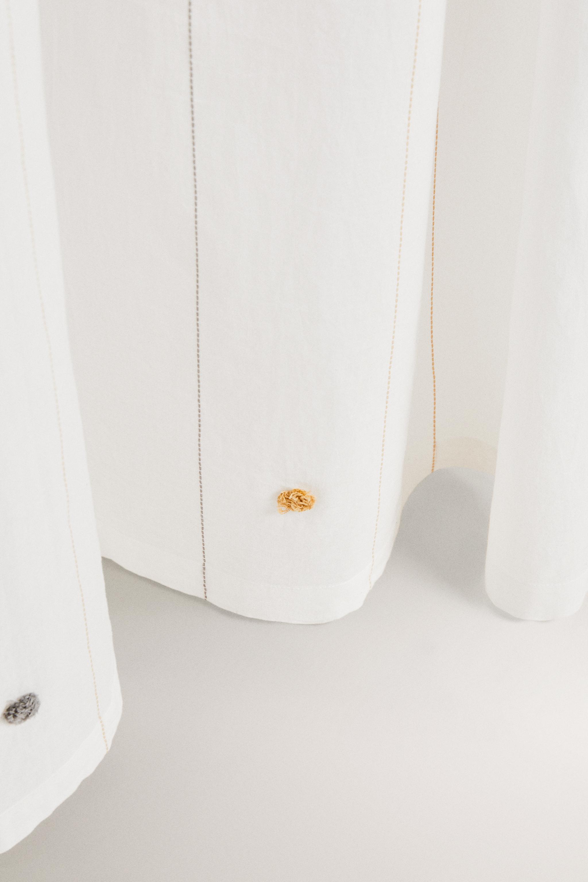 LOW OPACITY TASSEL CURTAIN