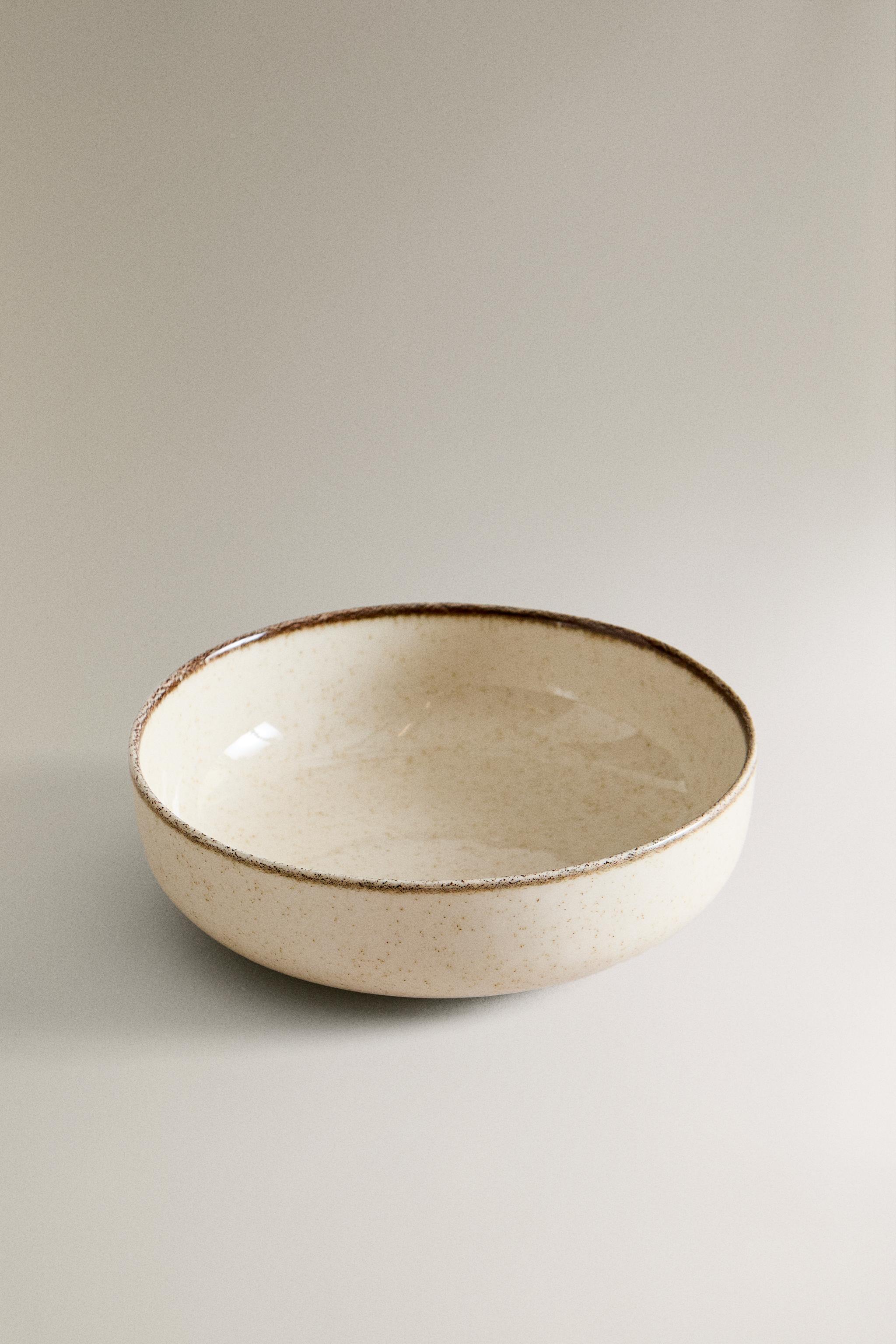PORCELAIN BOWL WITH ANTIQUE FINISH RIM