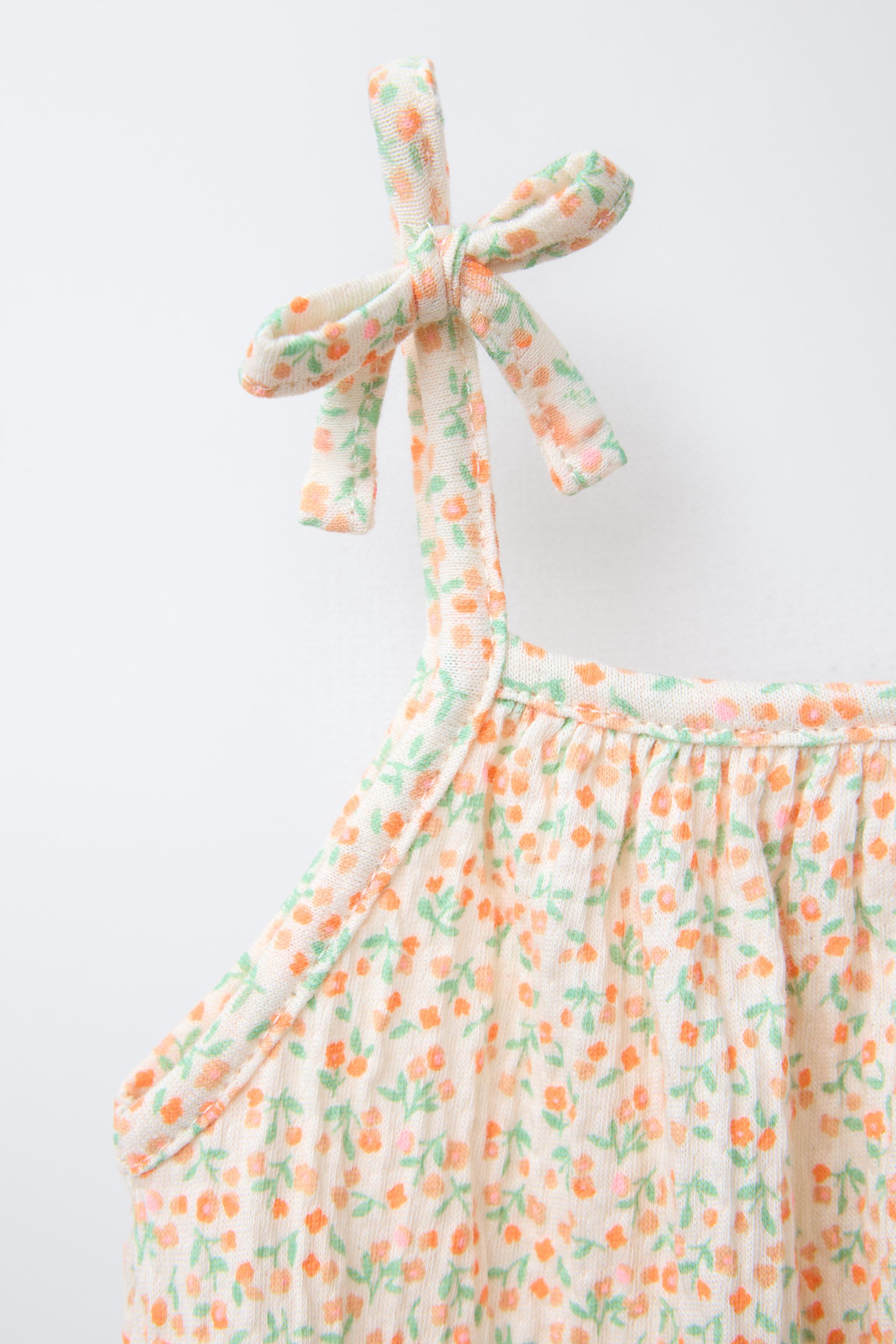 TEXTURED FLORAL BODYSUIT