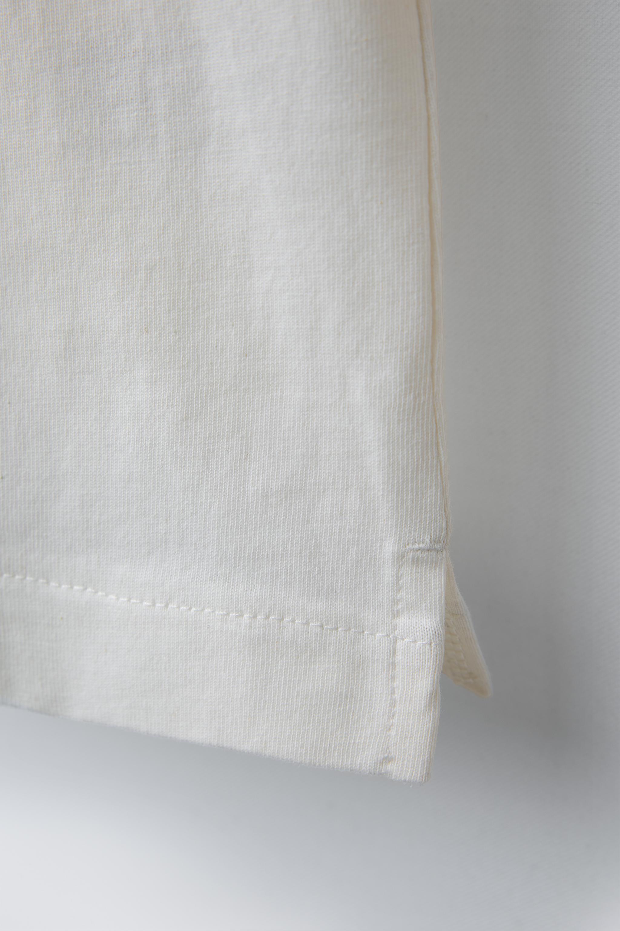 SLEEVELESS TOP WITH BUTTONS