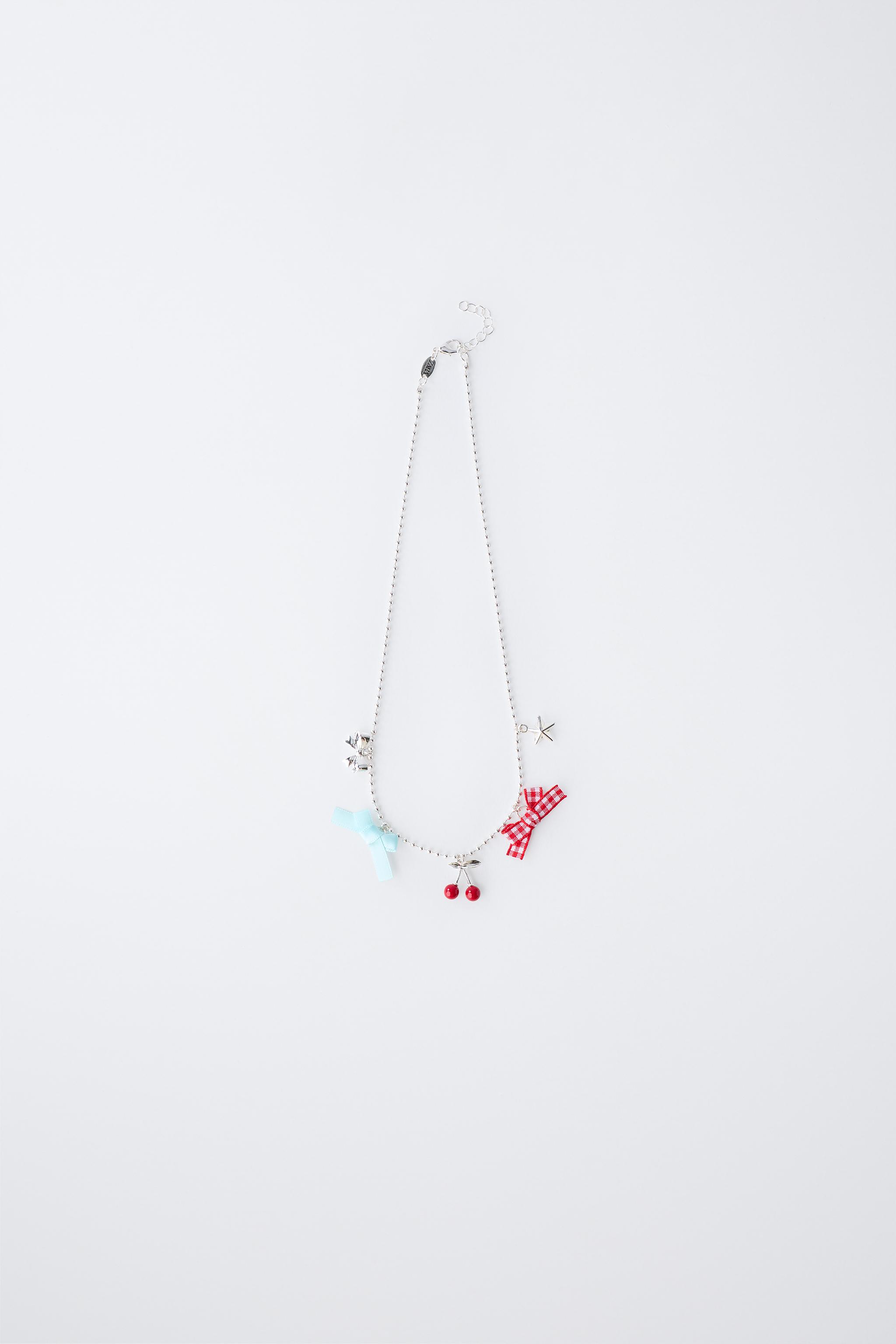 CHERRY AND BOW NECKLACE