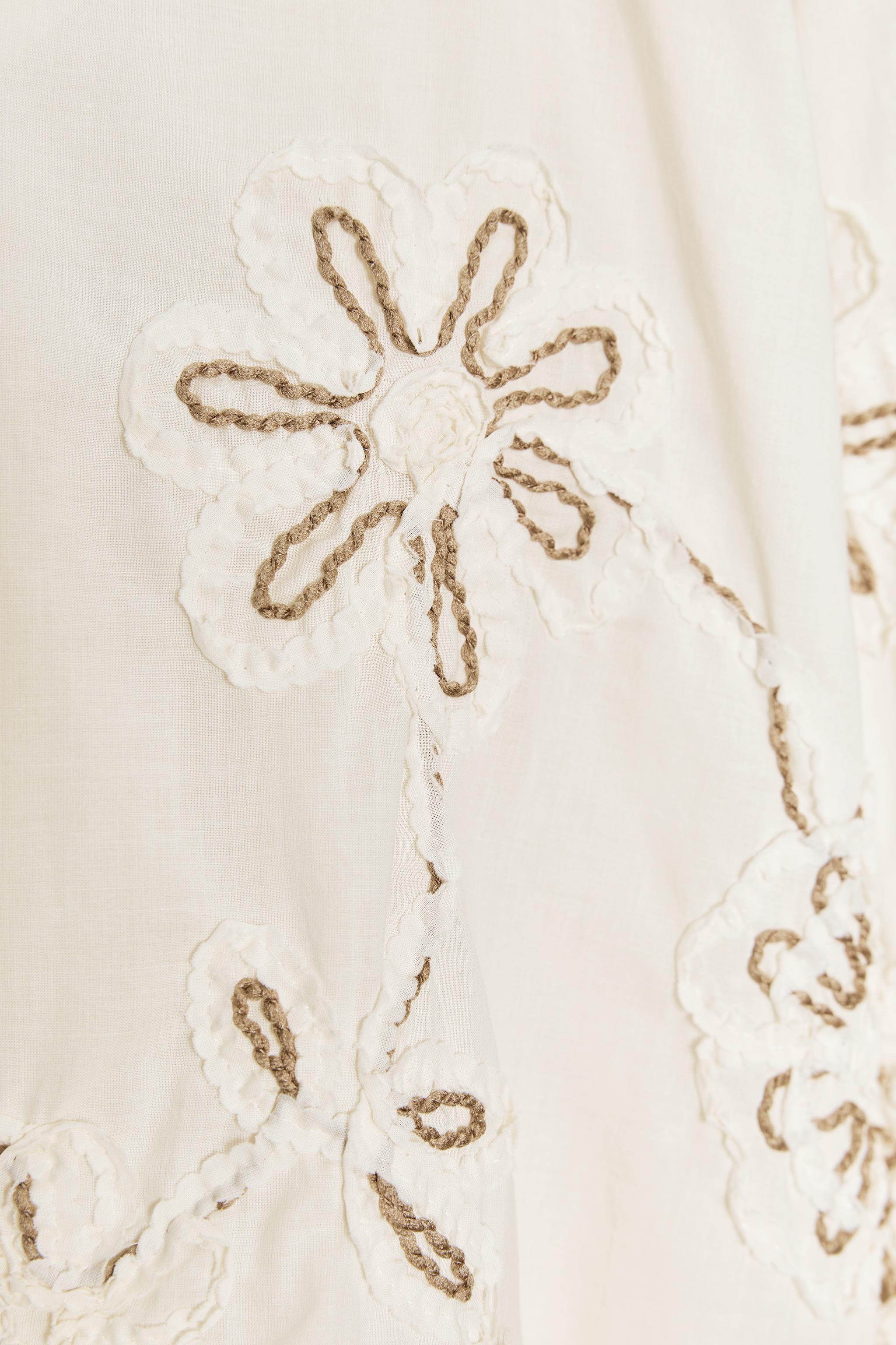 TEXTURED EMBROIDERED BLOUSE