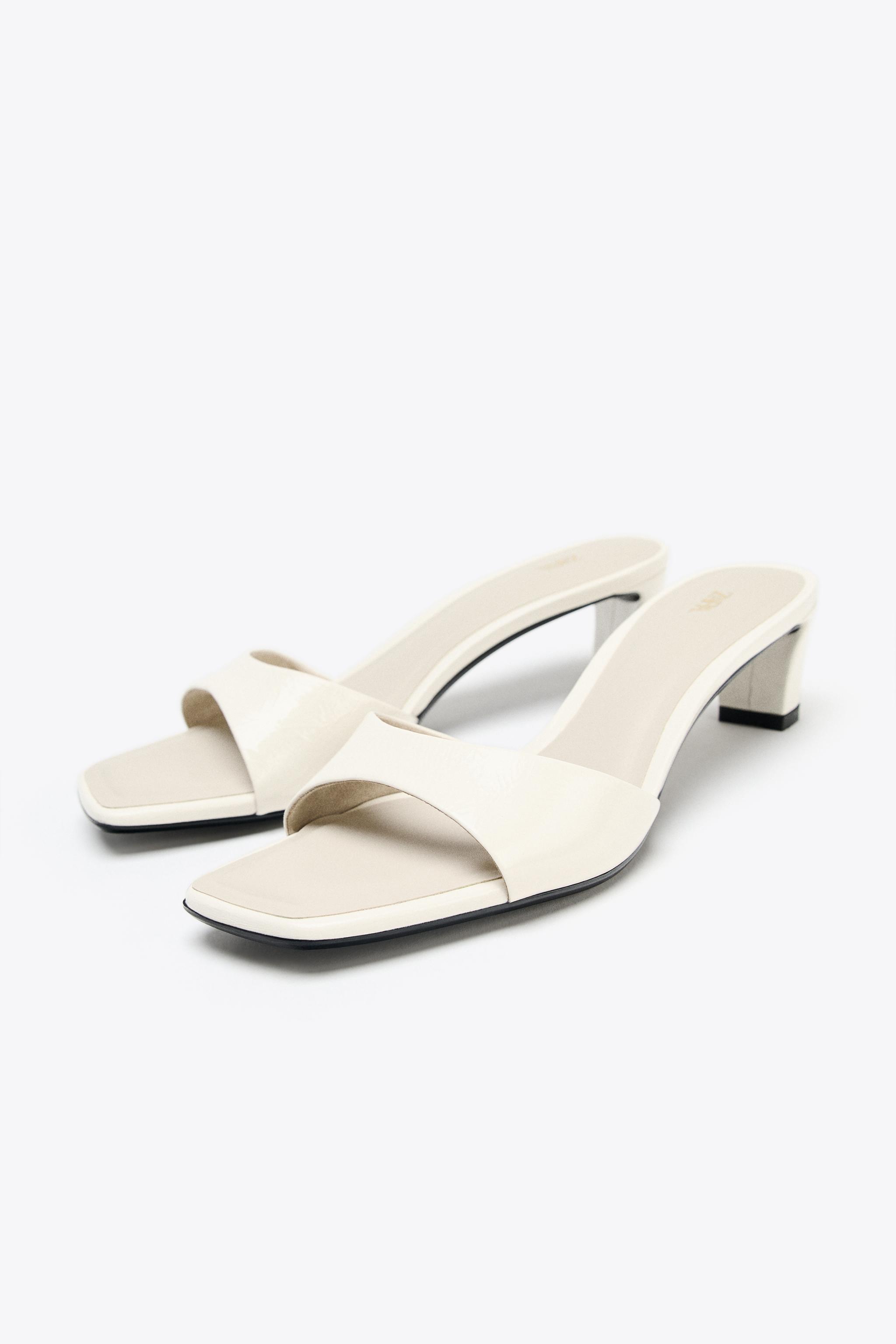 LOW HEELED LEATHER SANDALS