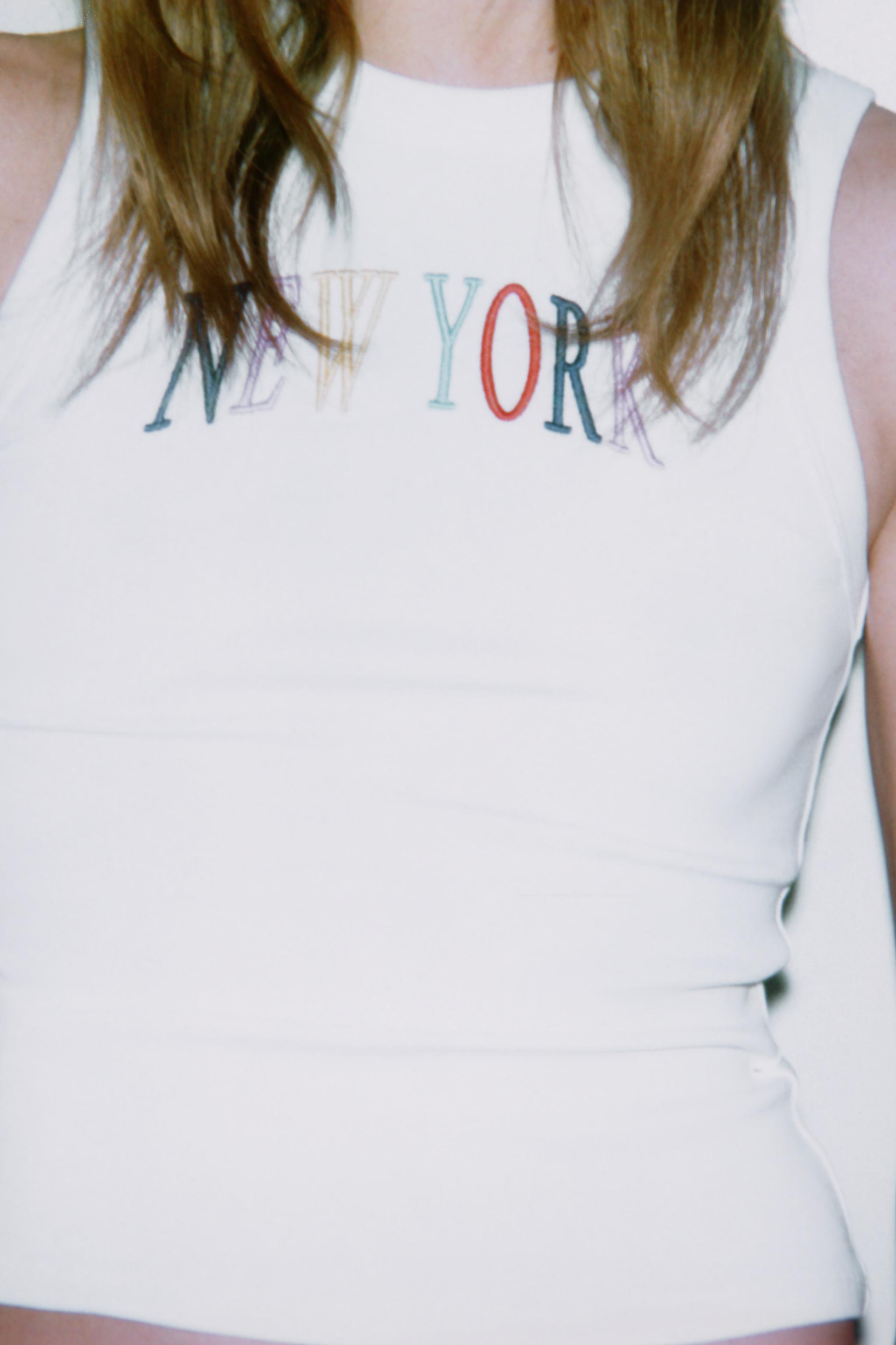 EMBROIDERED TEXT TOP