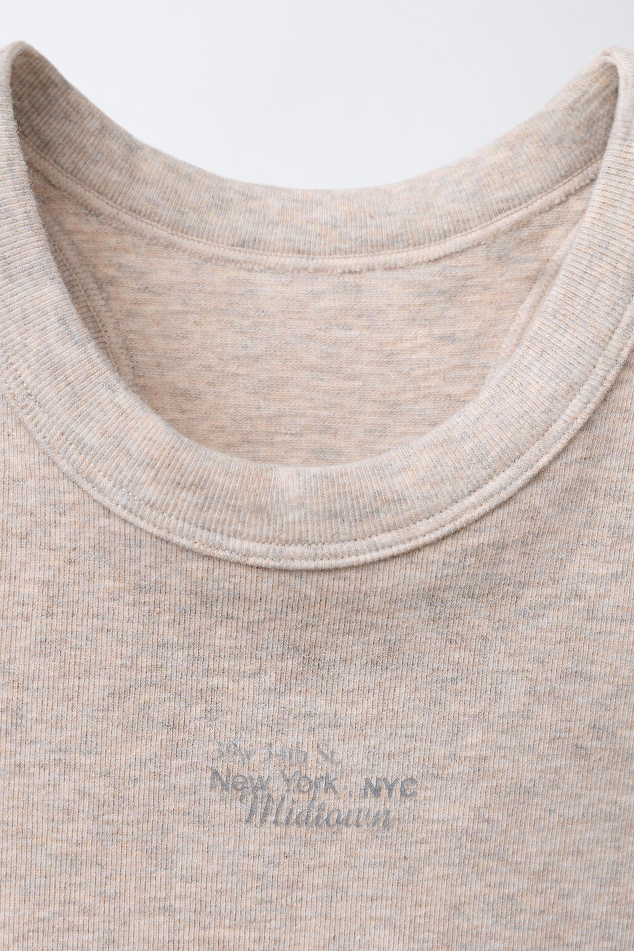 TEXT SEAMLESS CROP TOP
