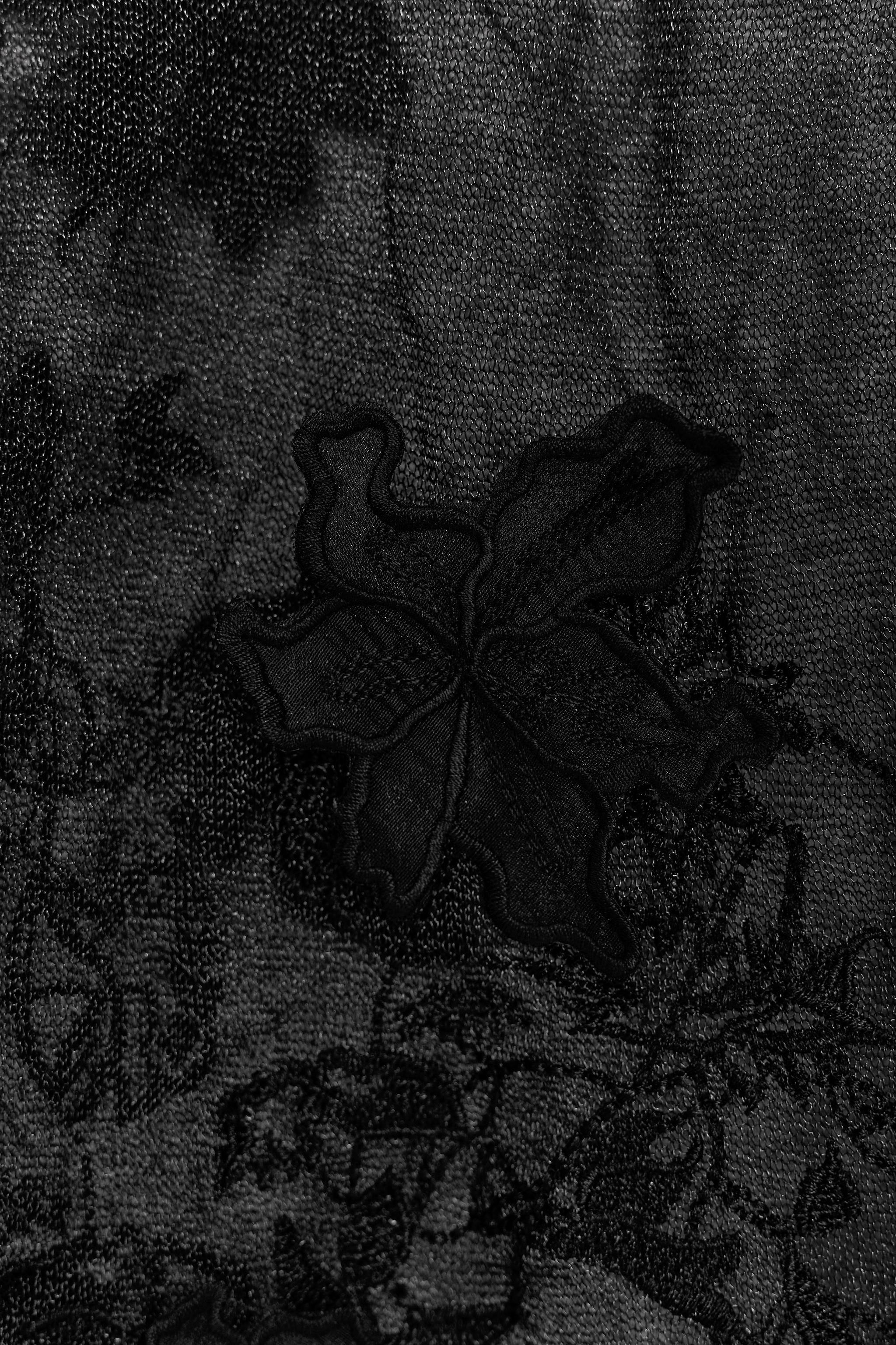 SEMI-SHEER STRUCTURED KNIT SKIRT