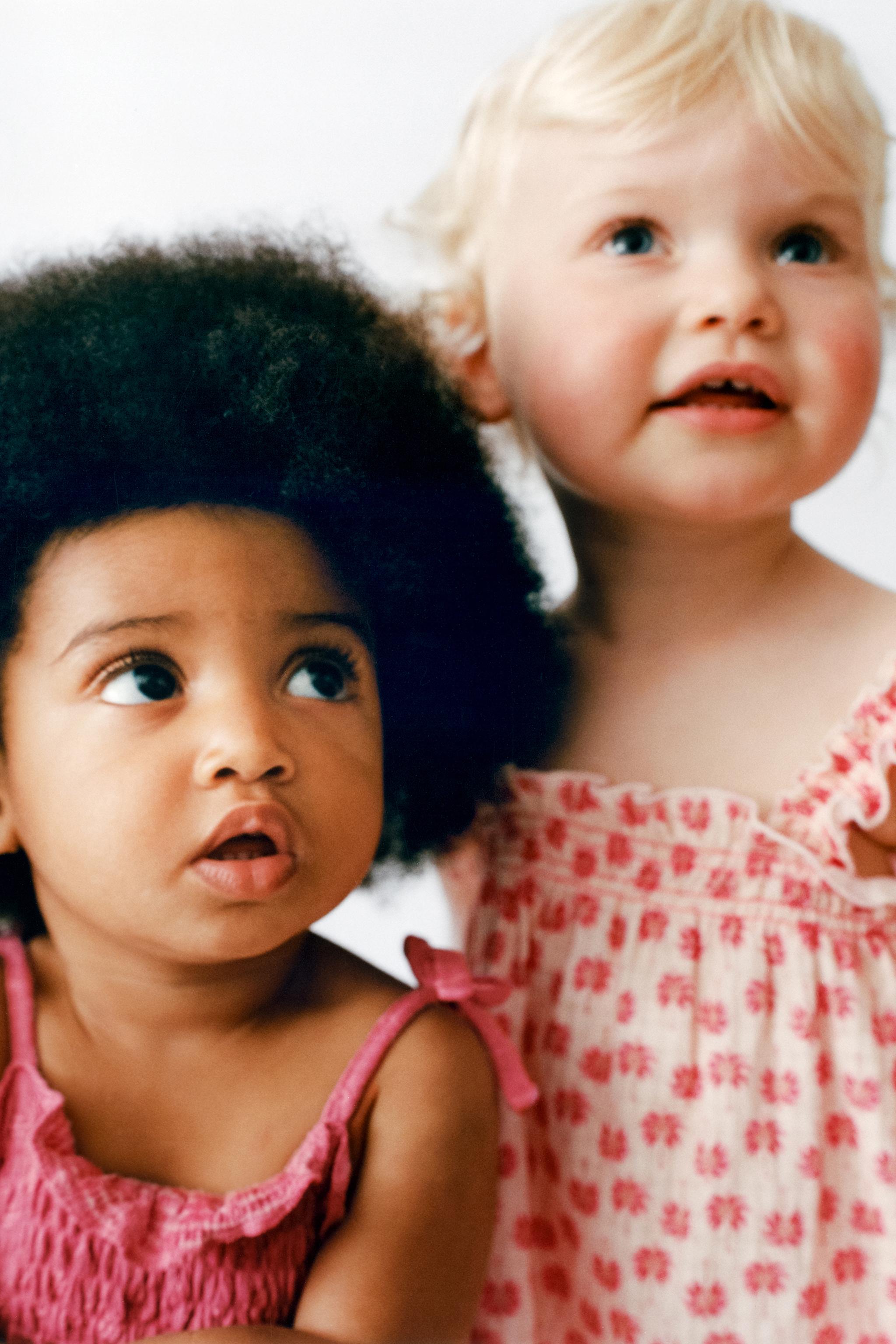 EMBROIDERED FLORAL BODYSUIT