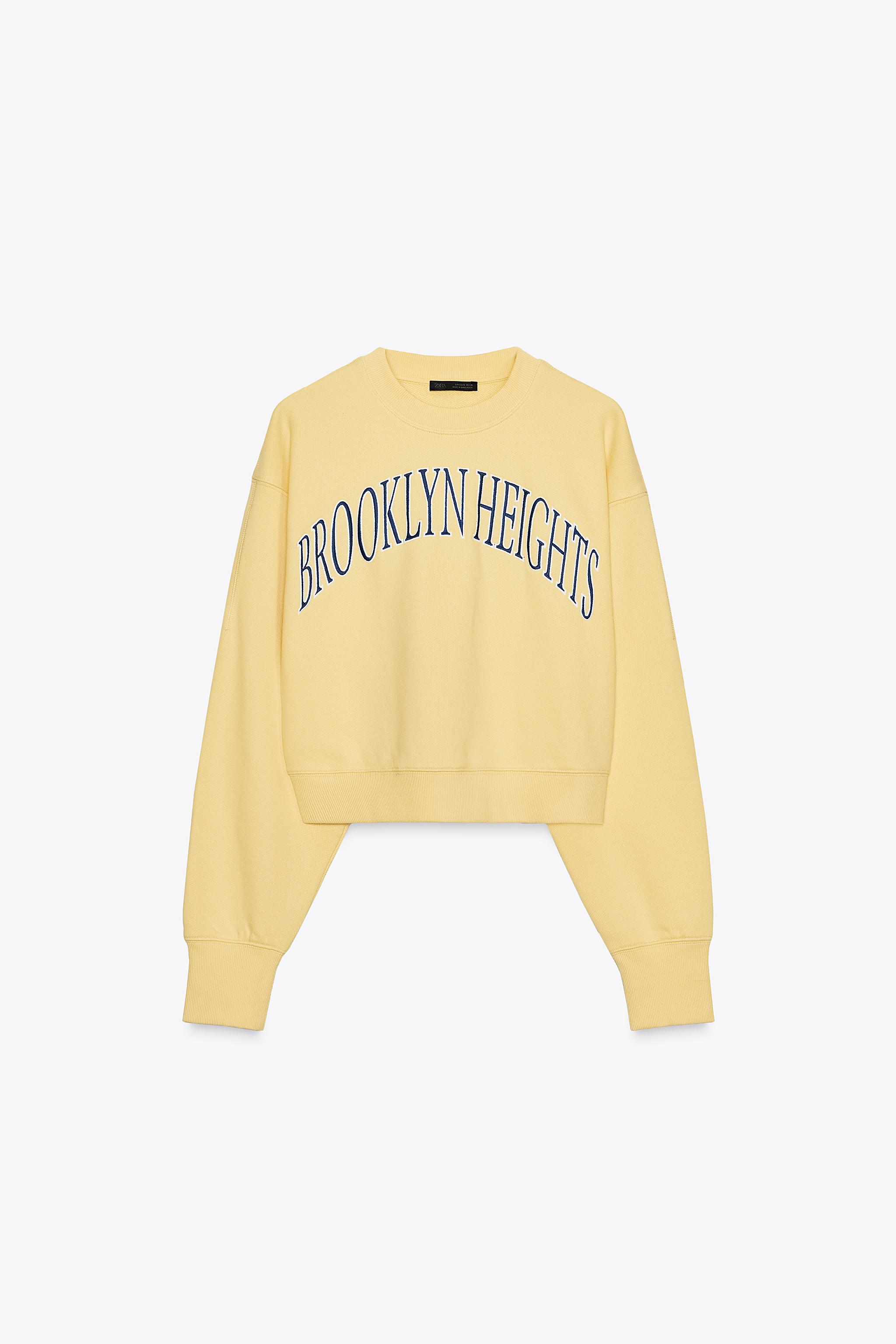 EMBROIDERED TEXT PLUSH SWEATSHIRT