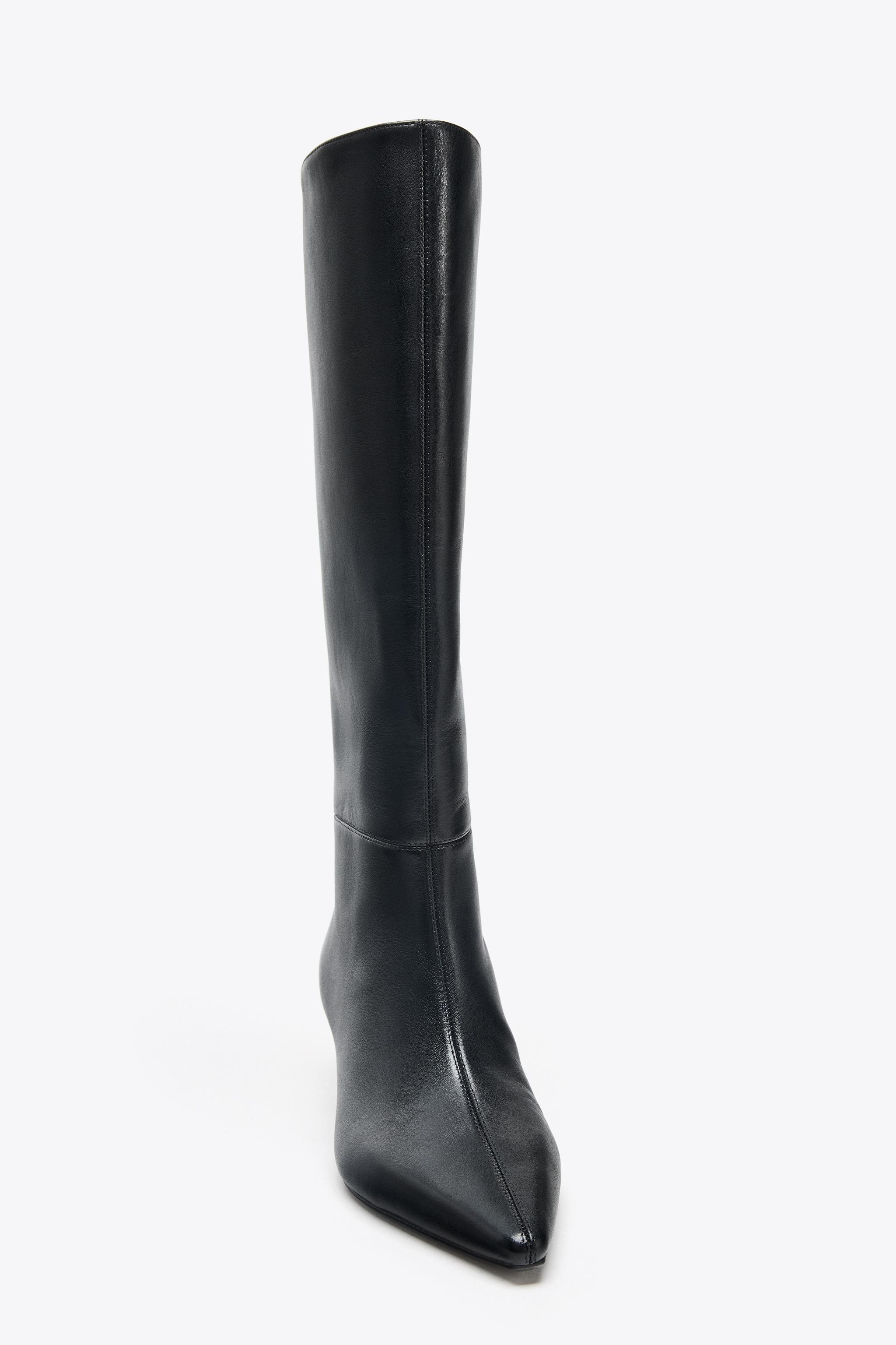 HEELED LEATHER BOOTS