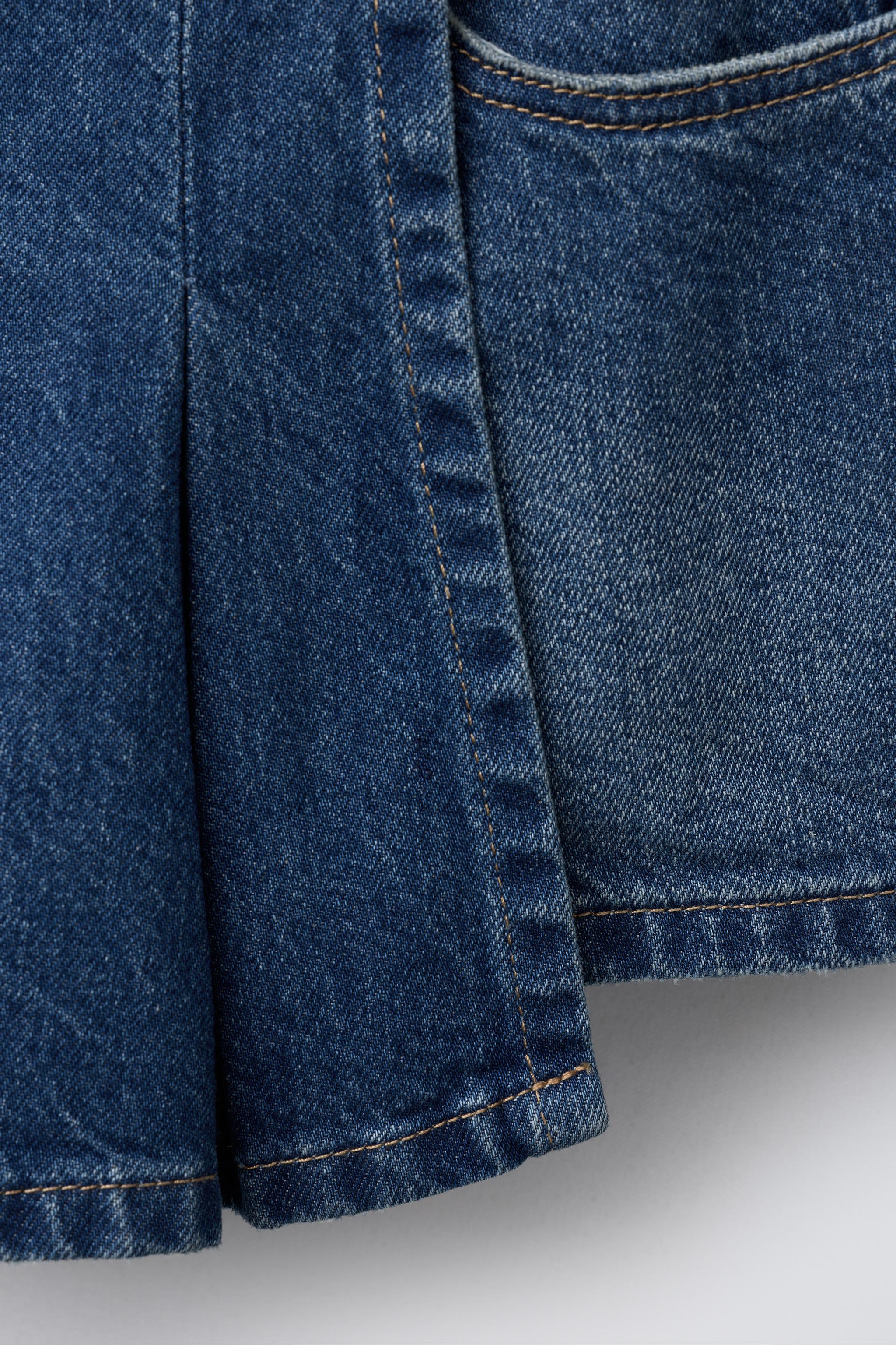 PLEATED DENIM SKORT