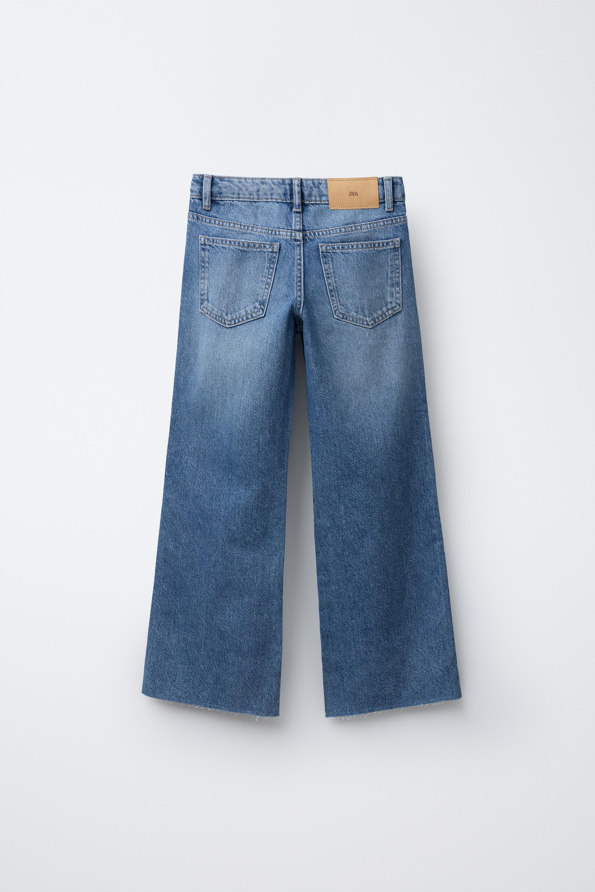 FRAYED BOOTCUT JEANS