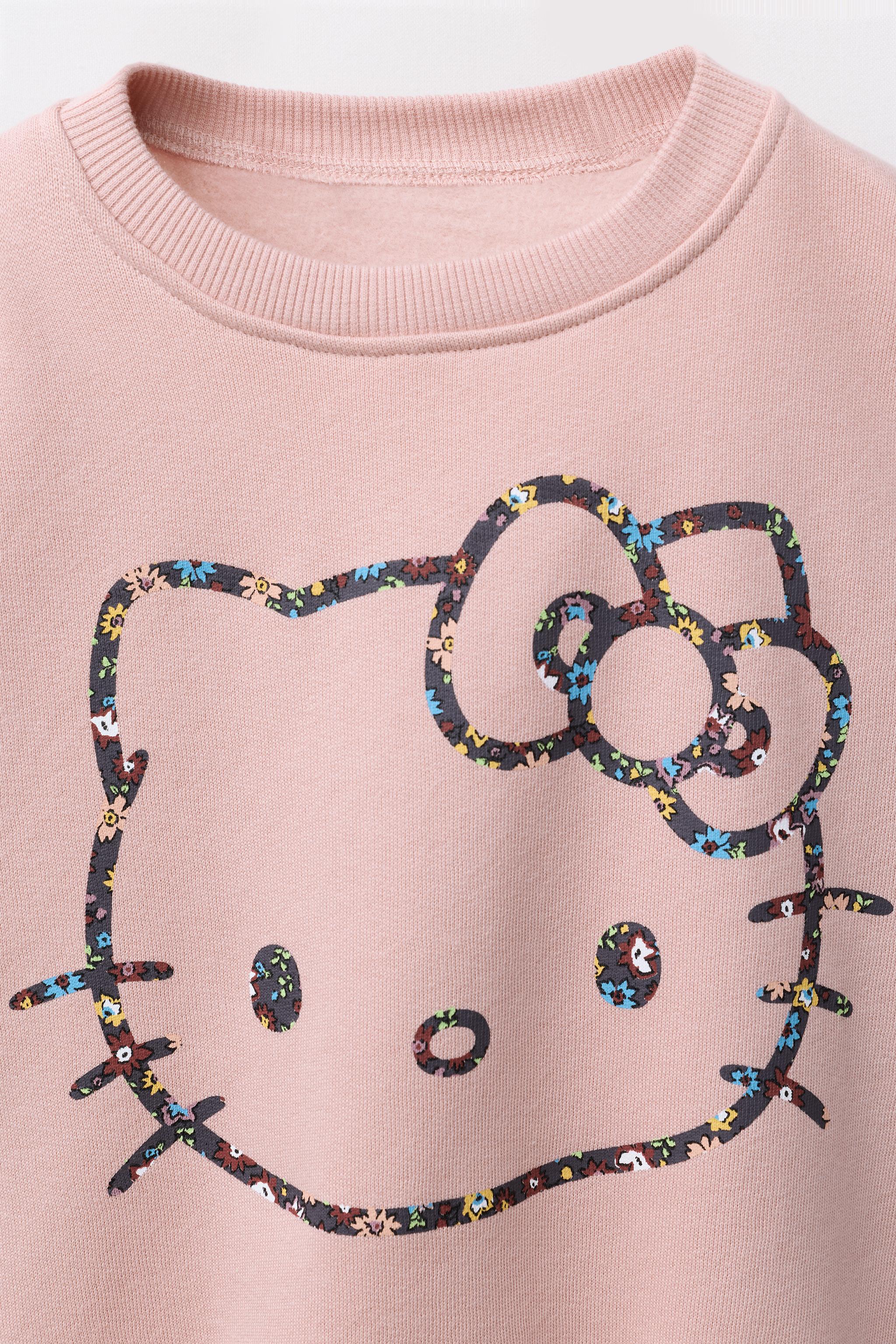 HELLO KITTY © SANRIO SWEATSHIRT AND FLORAL LEGGING SET