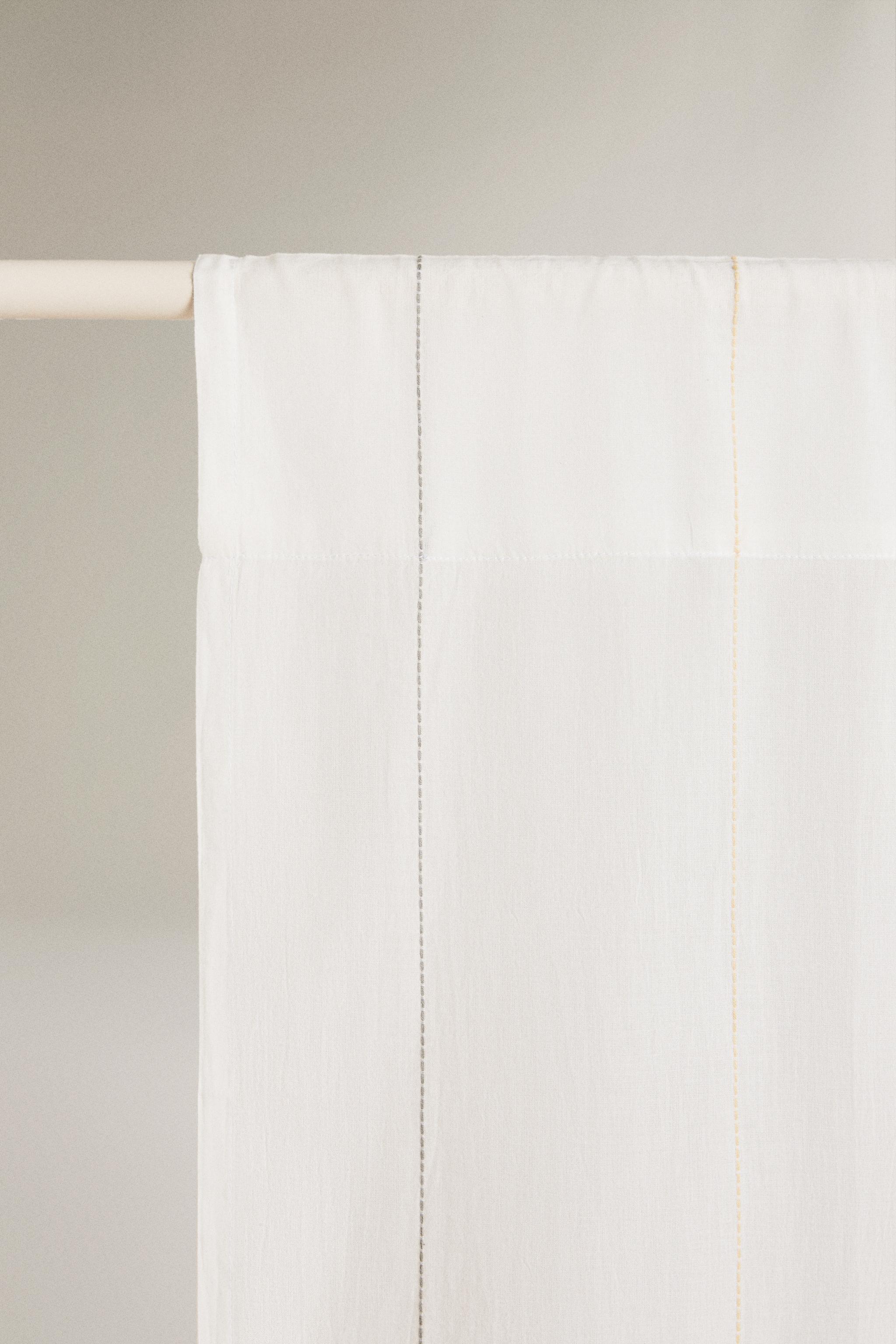 LOW OPACITY TASSEL CURTAIN