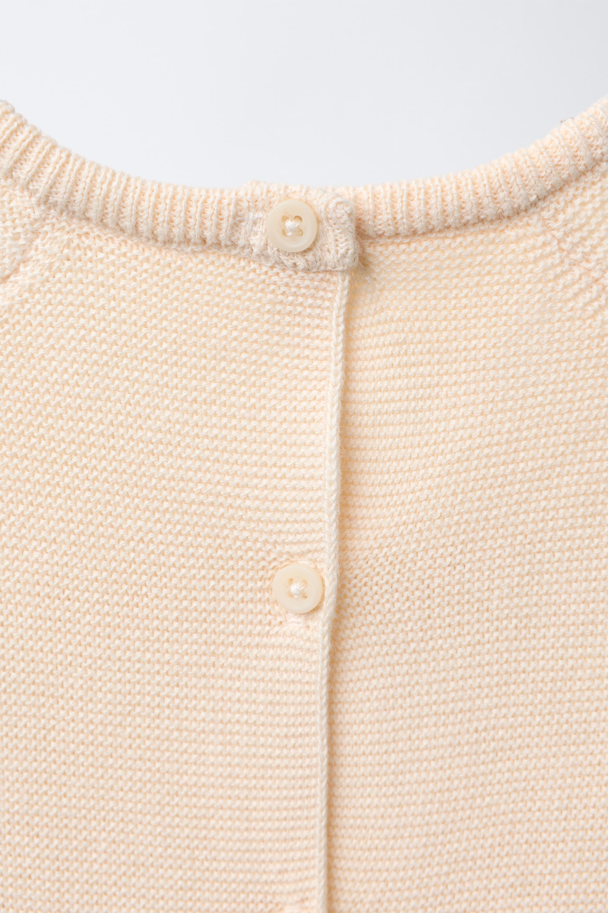 EMBROIDERED ELEPHANT KNIT SWEATER