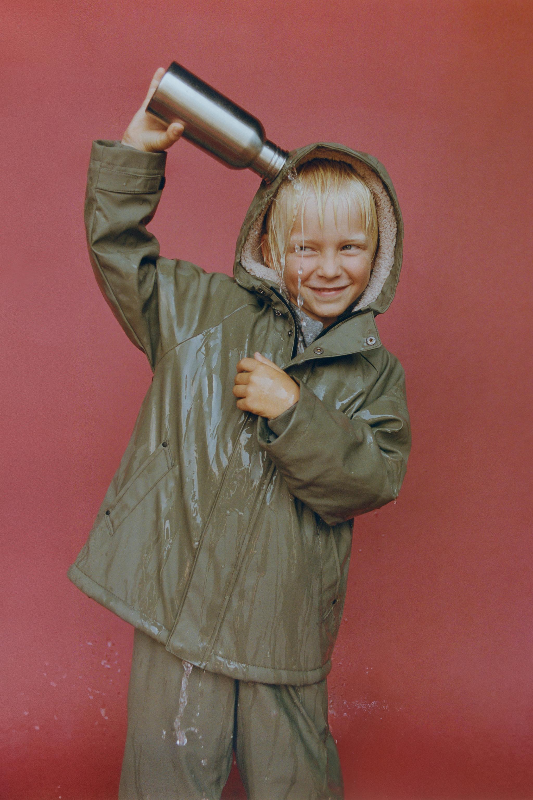 WATER REPELLENT FAUX SHEARLING COATED JACKET