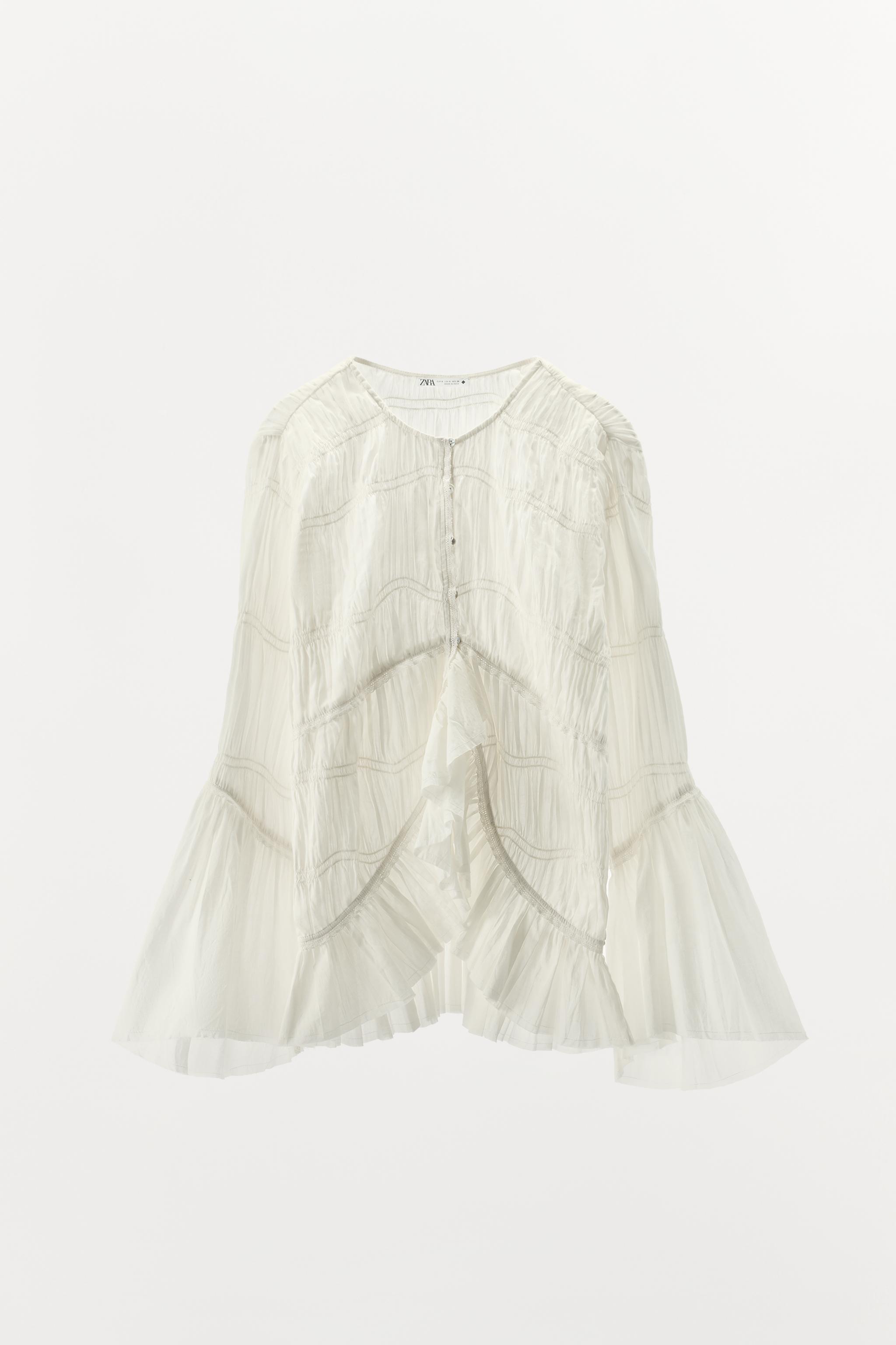 ASYMMETRIC TEXTURED BLOUSE LIMITED EDITION