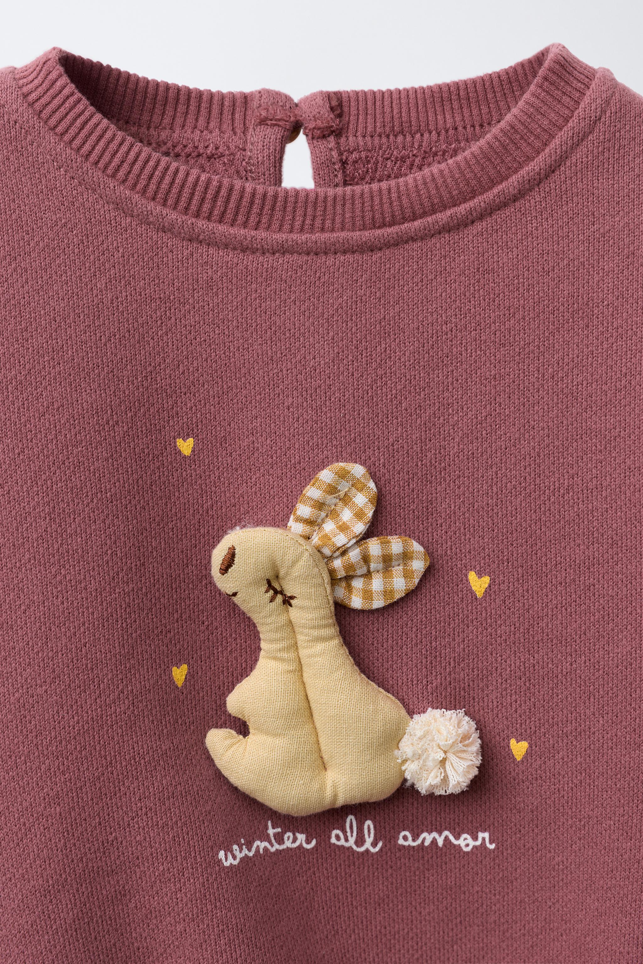 RABBIT APPLIQUÉ SWEATSHIRT