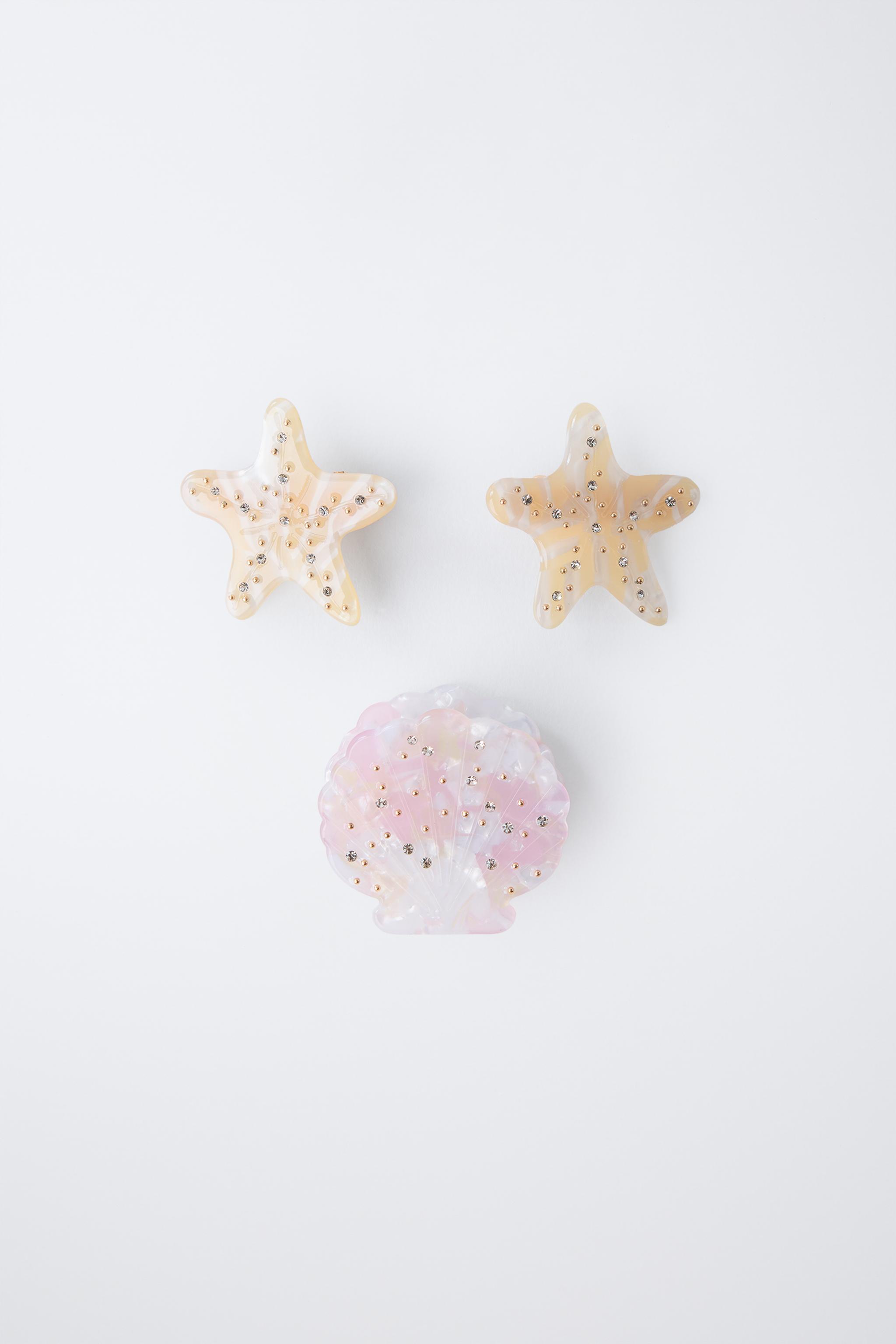 THREE-PACK OF SHELL AND STAR HAIR CLIPS