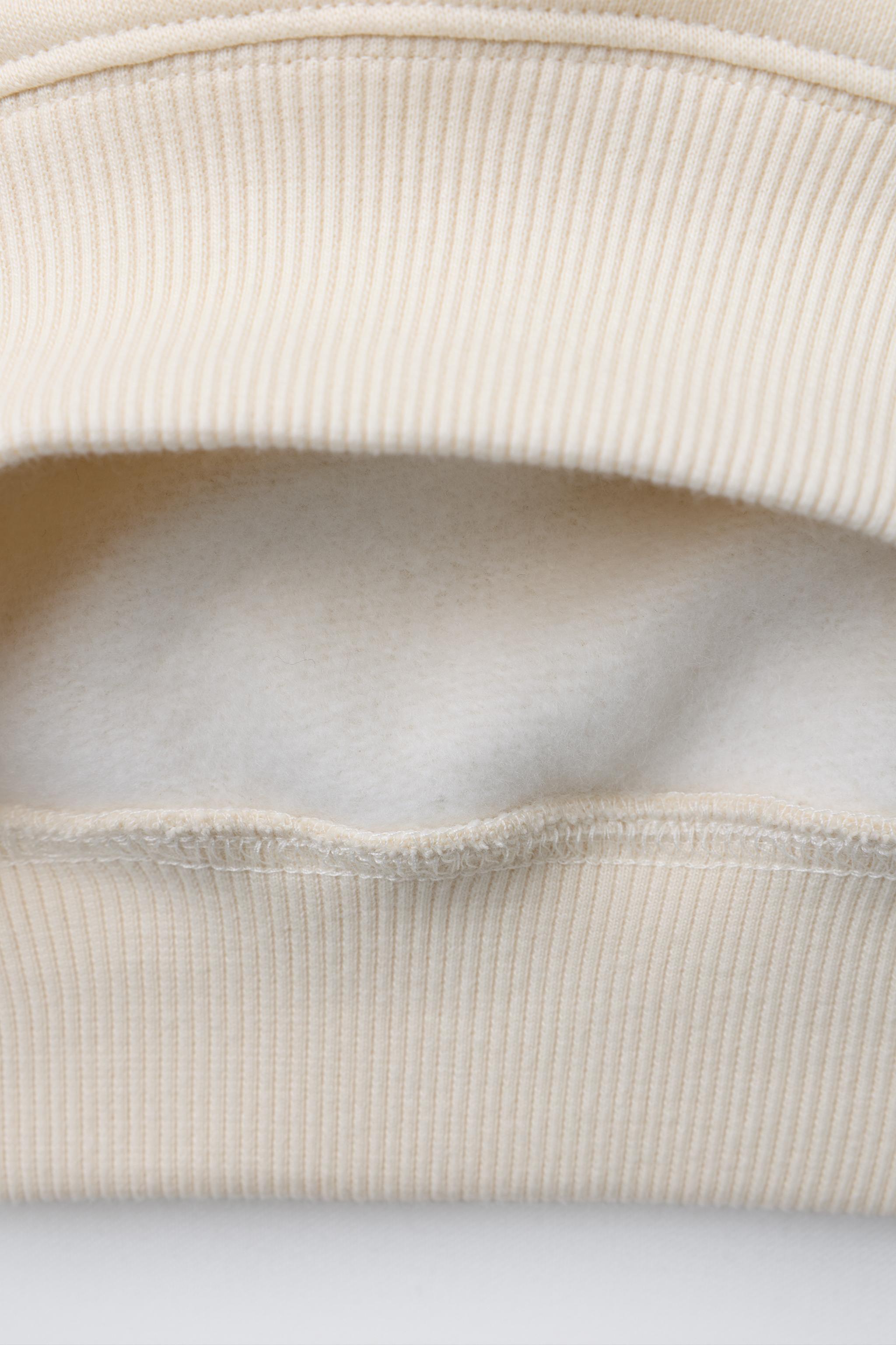 TEXT AND BOW PRINT SWEATSHIRT