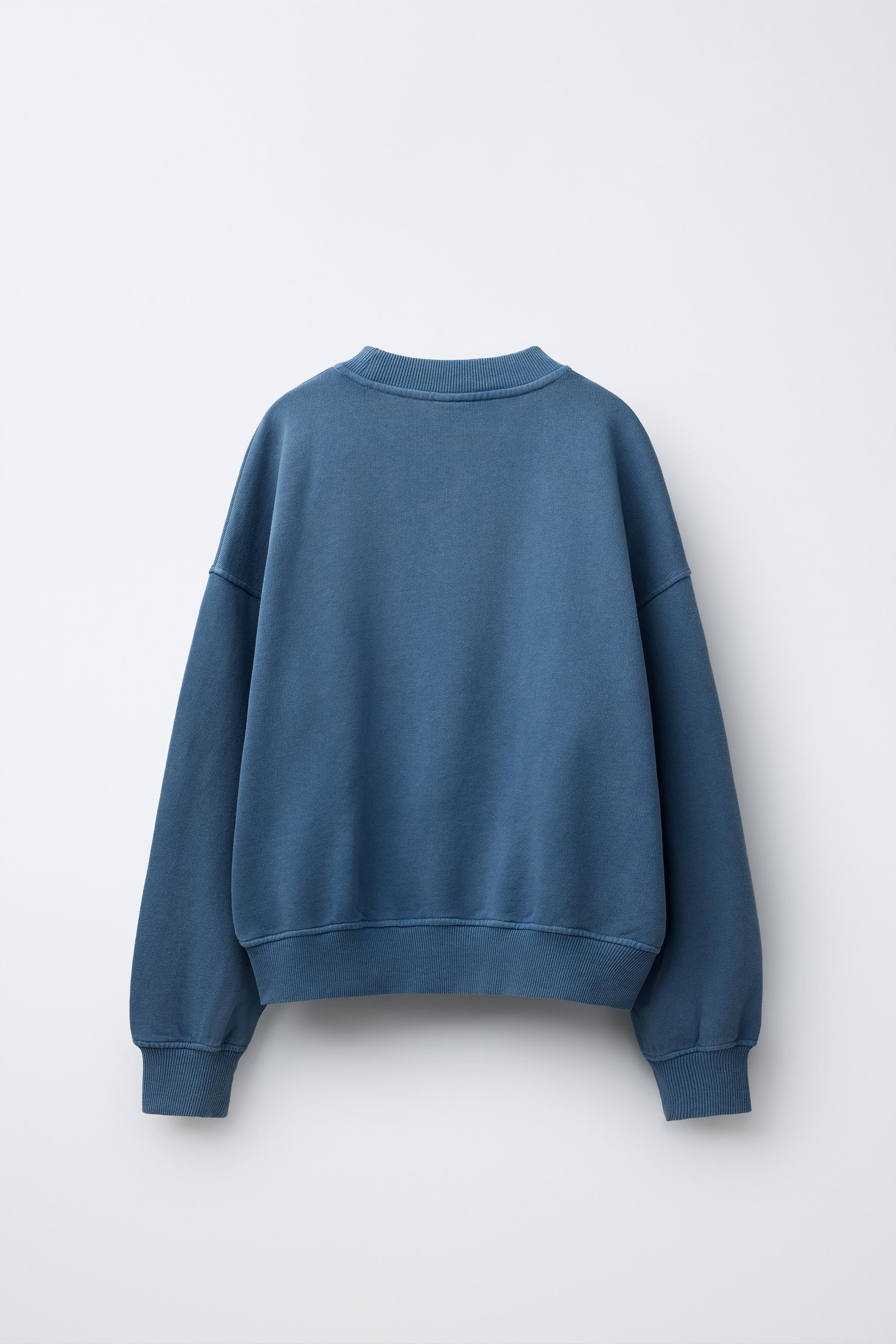 WASHED EFFECT STUDDED STAR SWEATSHIRT