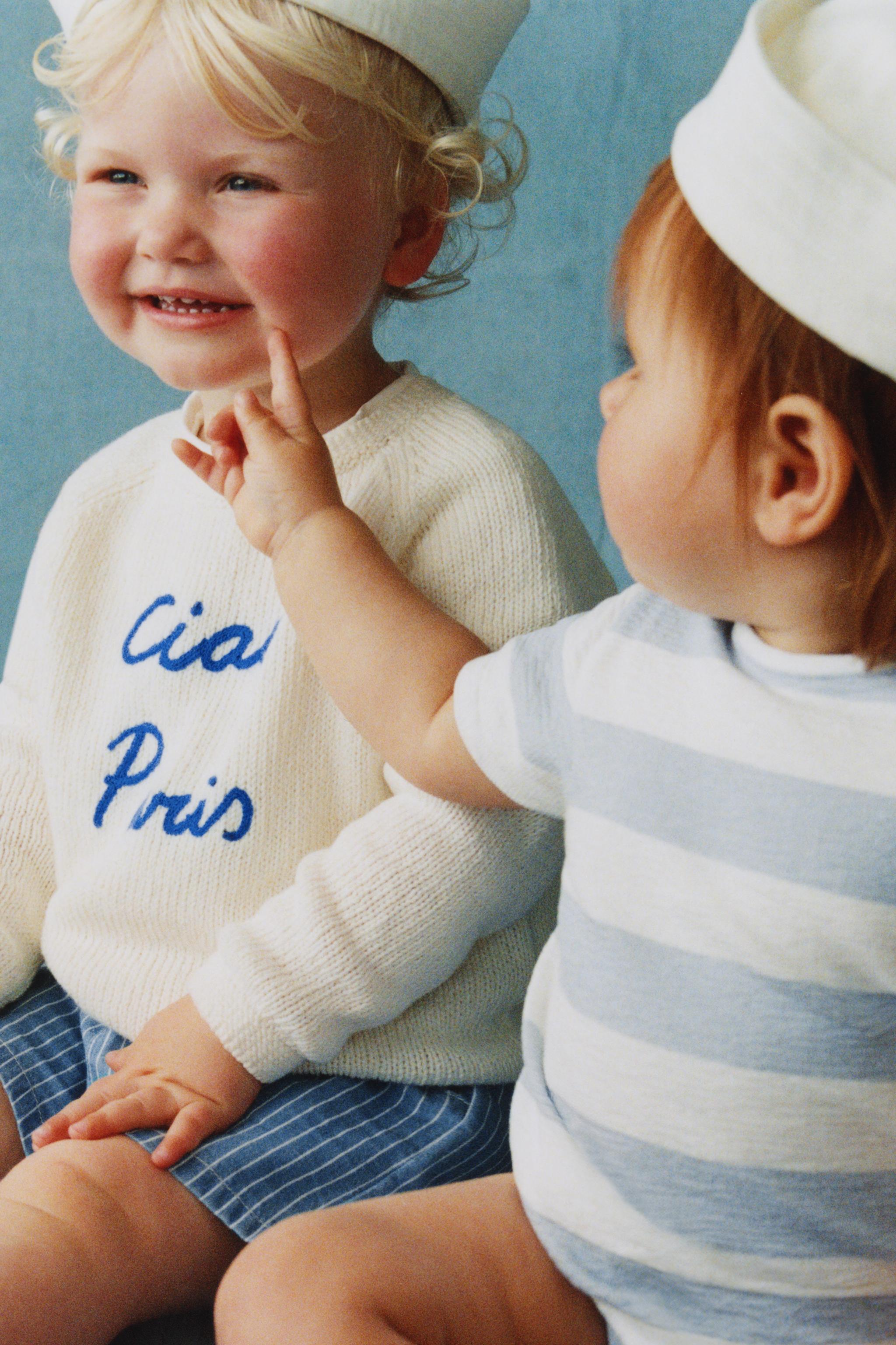 EMBROIDERED TEXT KNIT SWEATER