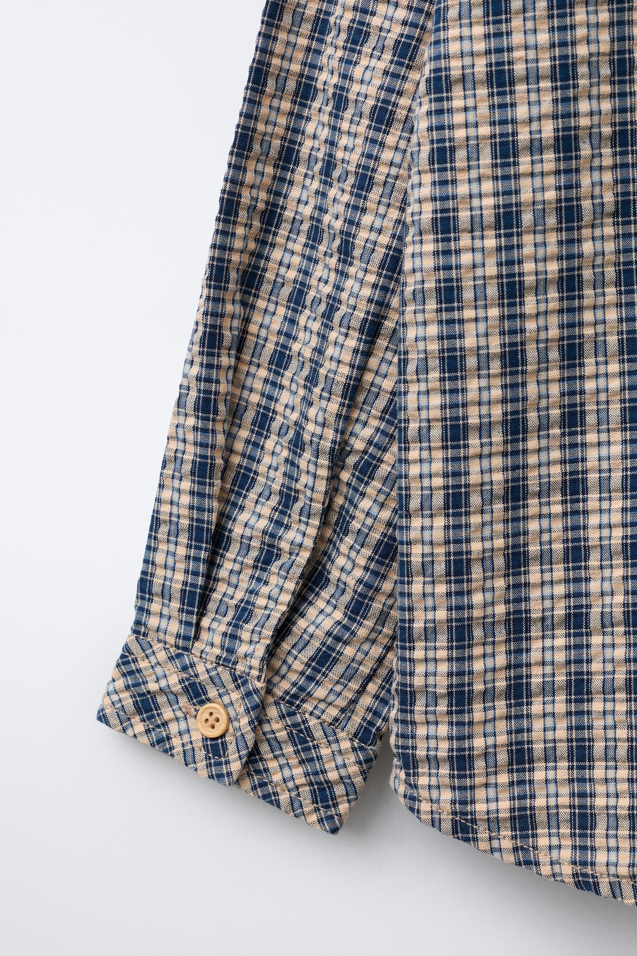 PLAID SHIRT SNOOPY PEANUTS™