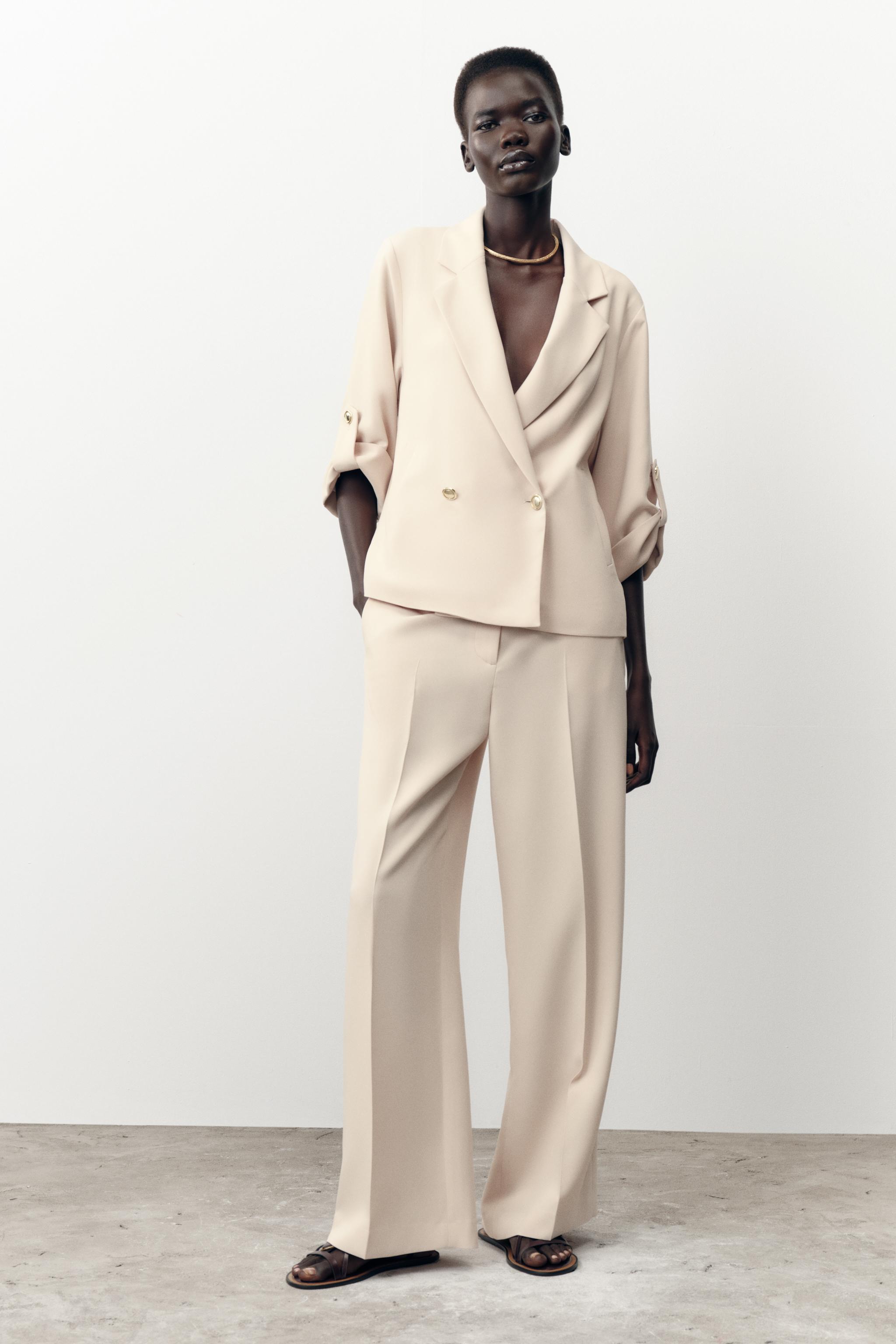 DOUBLE BREASTED BLAZER WITH TABBED SLEEVES